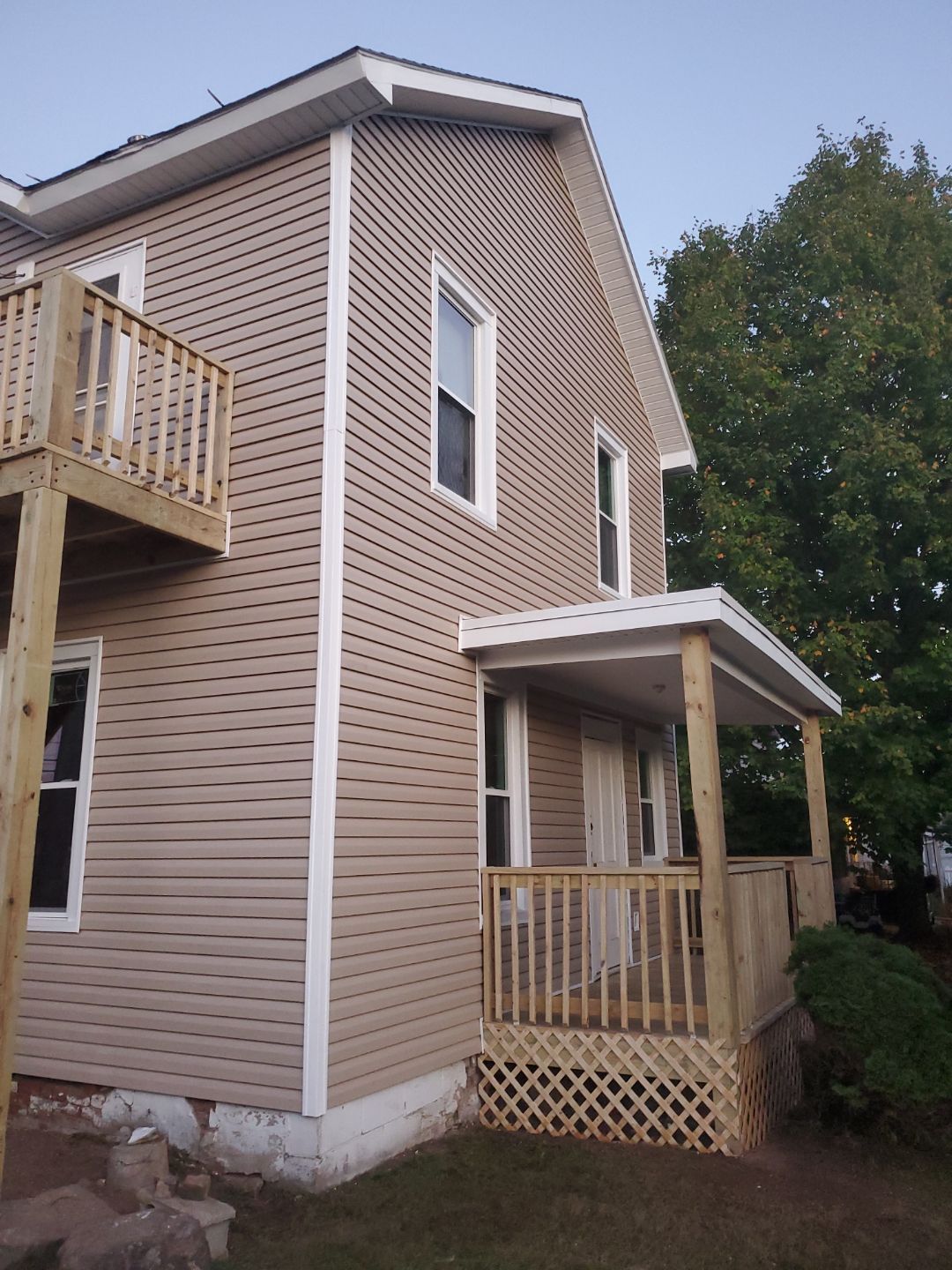 Siding Installation using Vinyl Siding by Rainstoppers Roofing