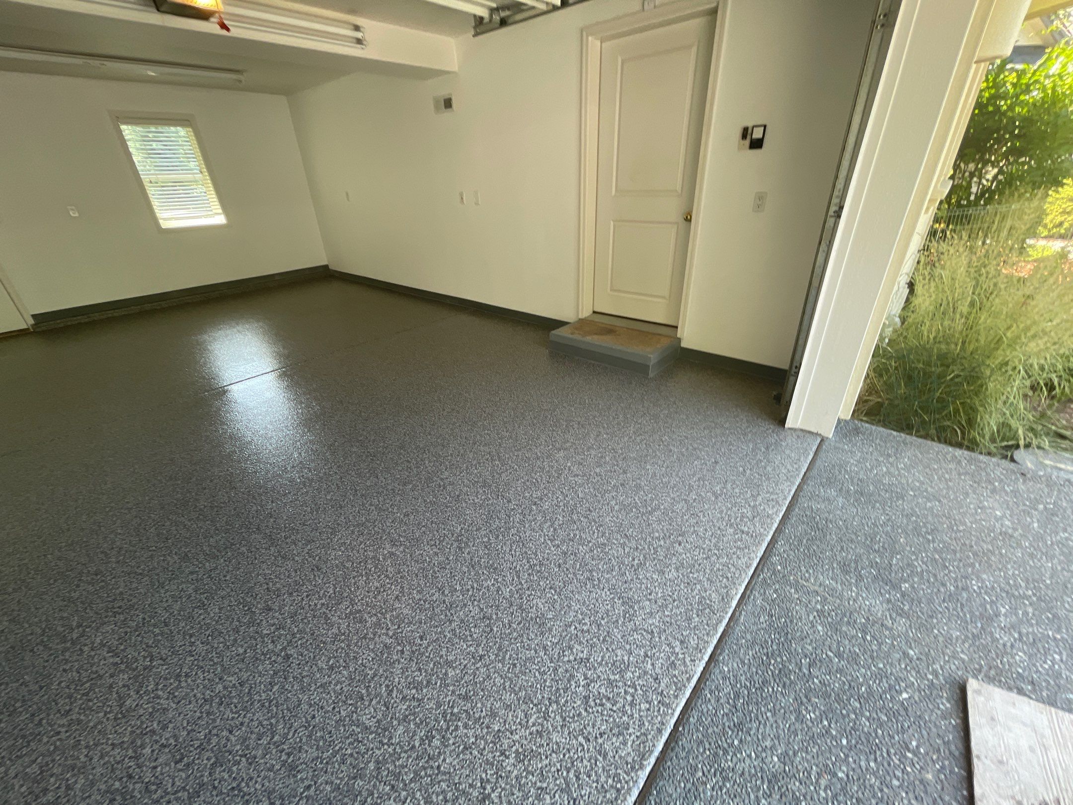 Garage Transformation using Echo 1/4" Chip by Croc Coatings, LLC