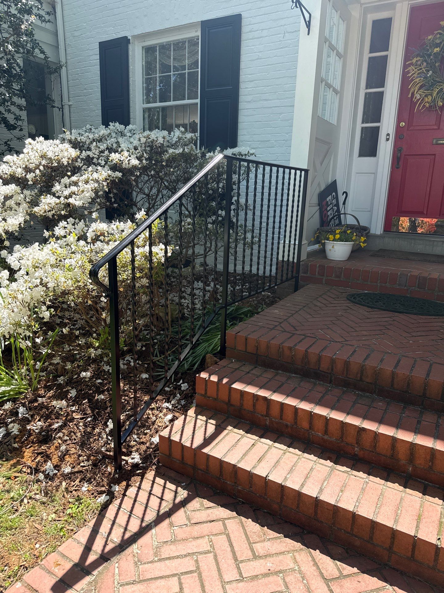 Custom Wrought Iron Handrails for Herringbone Brick Stairs in DC by Capitol Iron Works