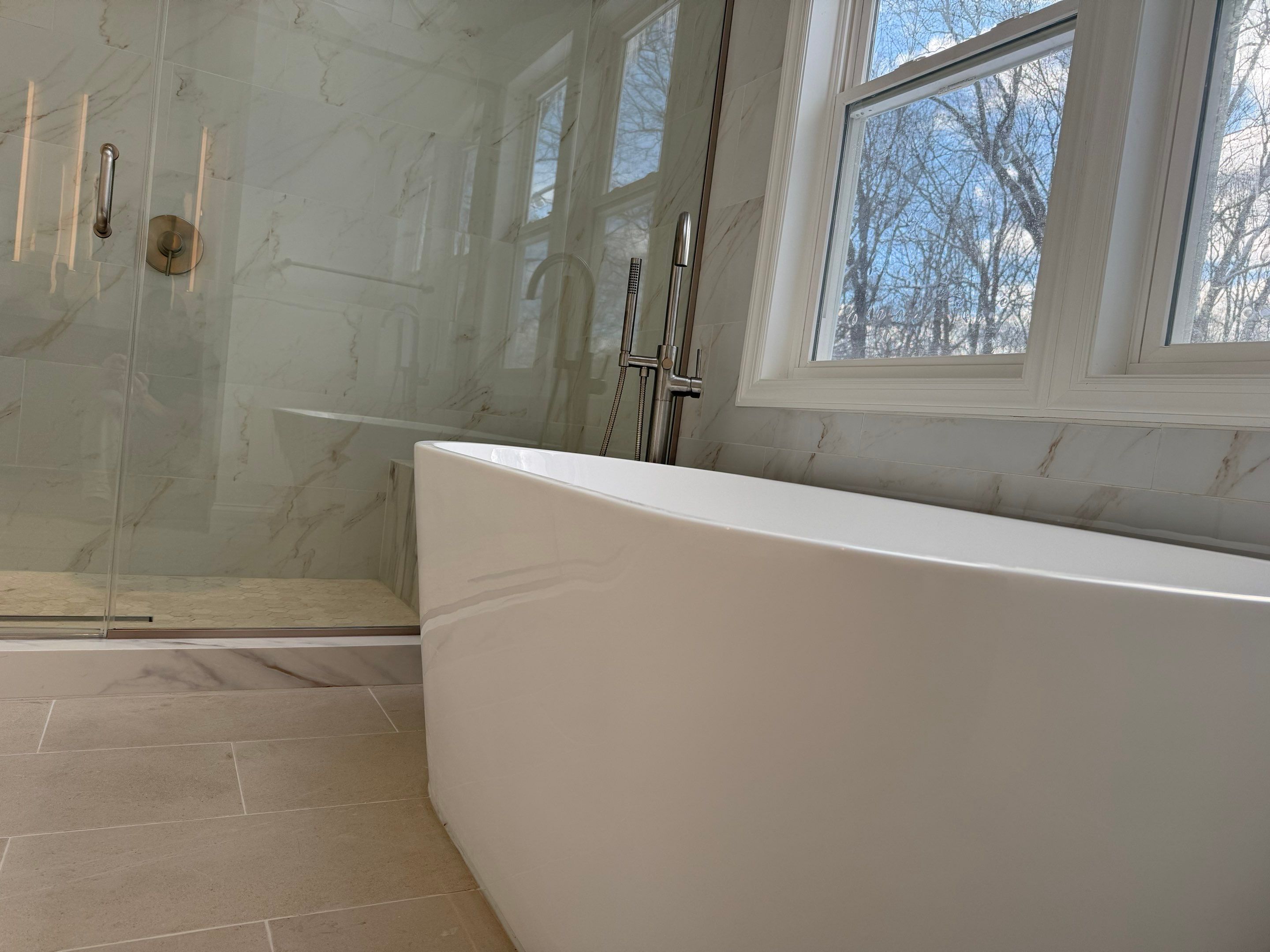 Bathroom Remodel using Tile by Home Concepts Construction