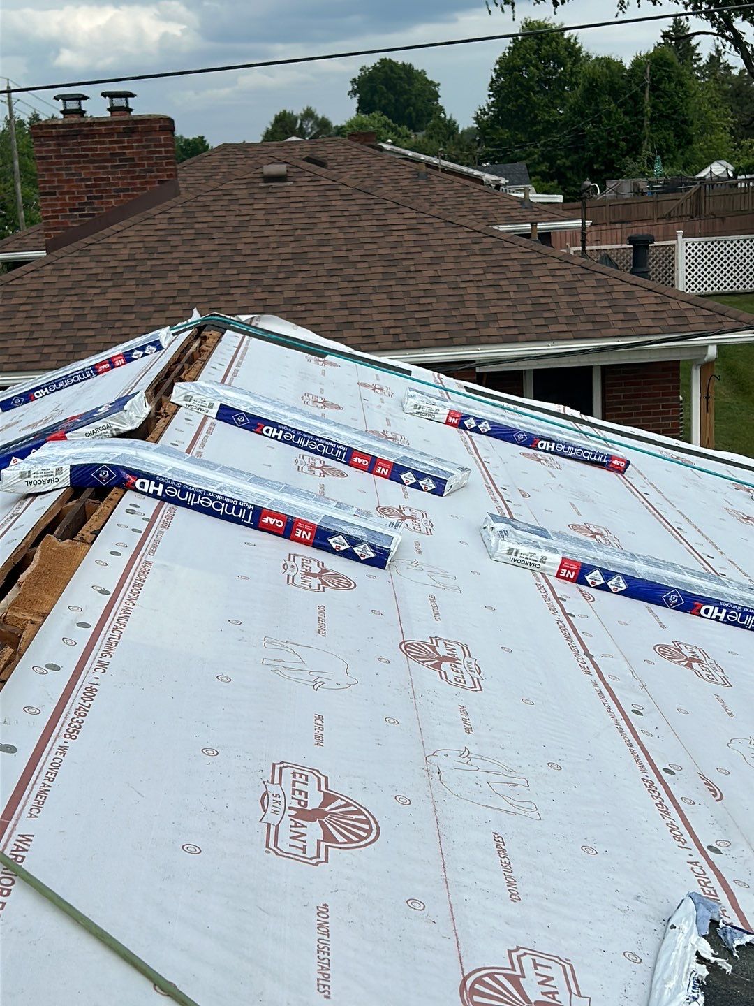 Residential Roofing Installation using Performance Shingles by Mr. Roofer