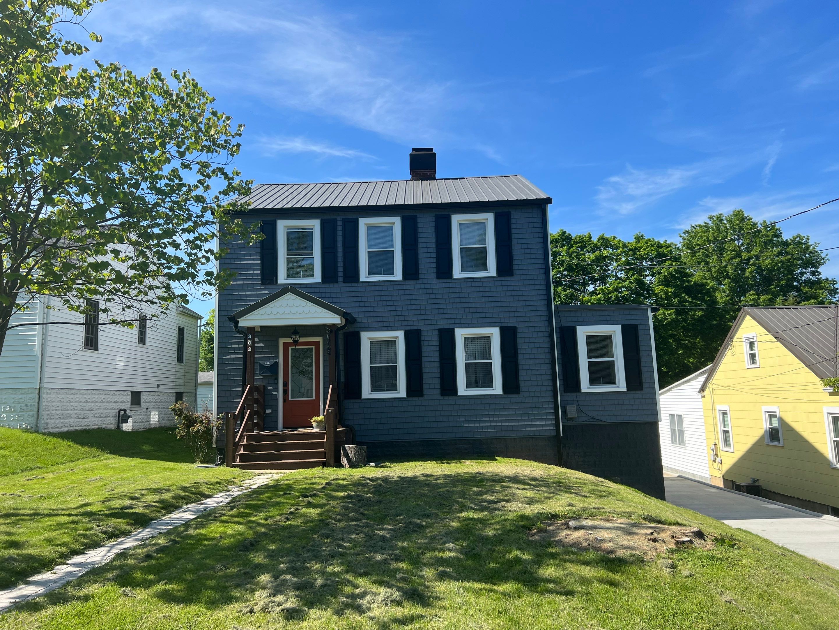 Siding Installation using Exterior Portfolio Portsmouth Vinyl Cedar Shakes by Secure Construction Company Inc