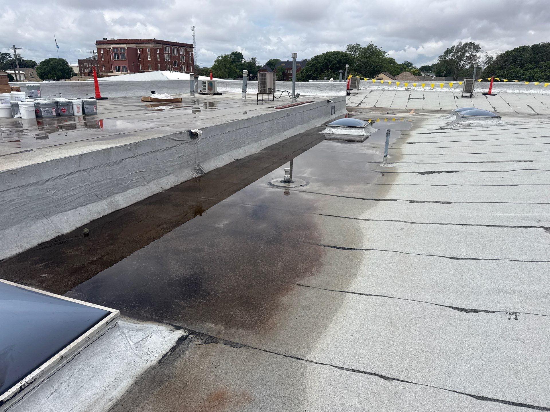 Hollis High School Comprehensive TPO Roof Replacement and Restoration by Secondary Rhodes