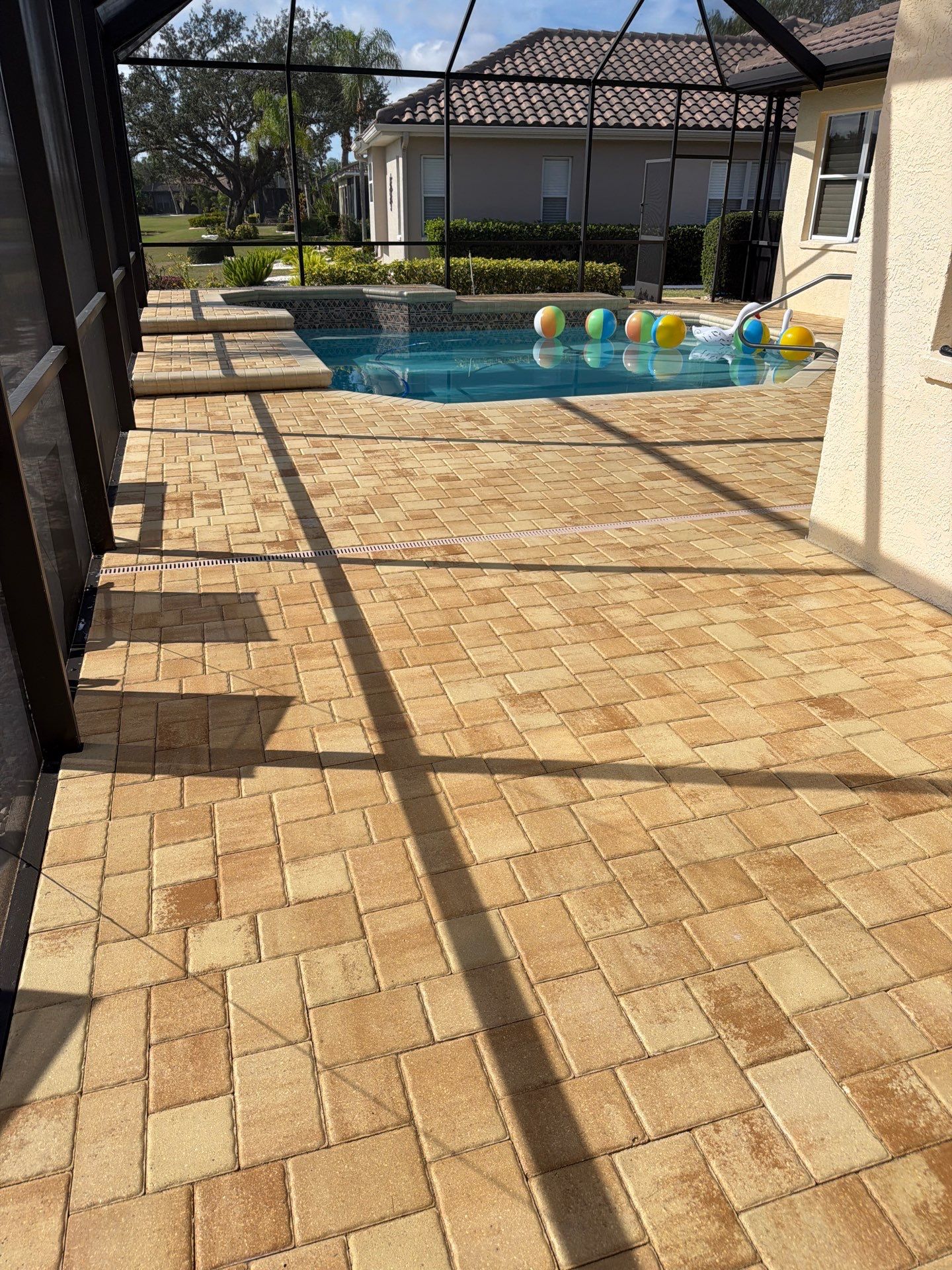 Custom Tan Paver Pool Deck and Patio in Sun City Center by Supreme Paver Experts