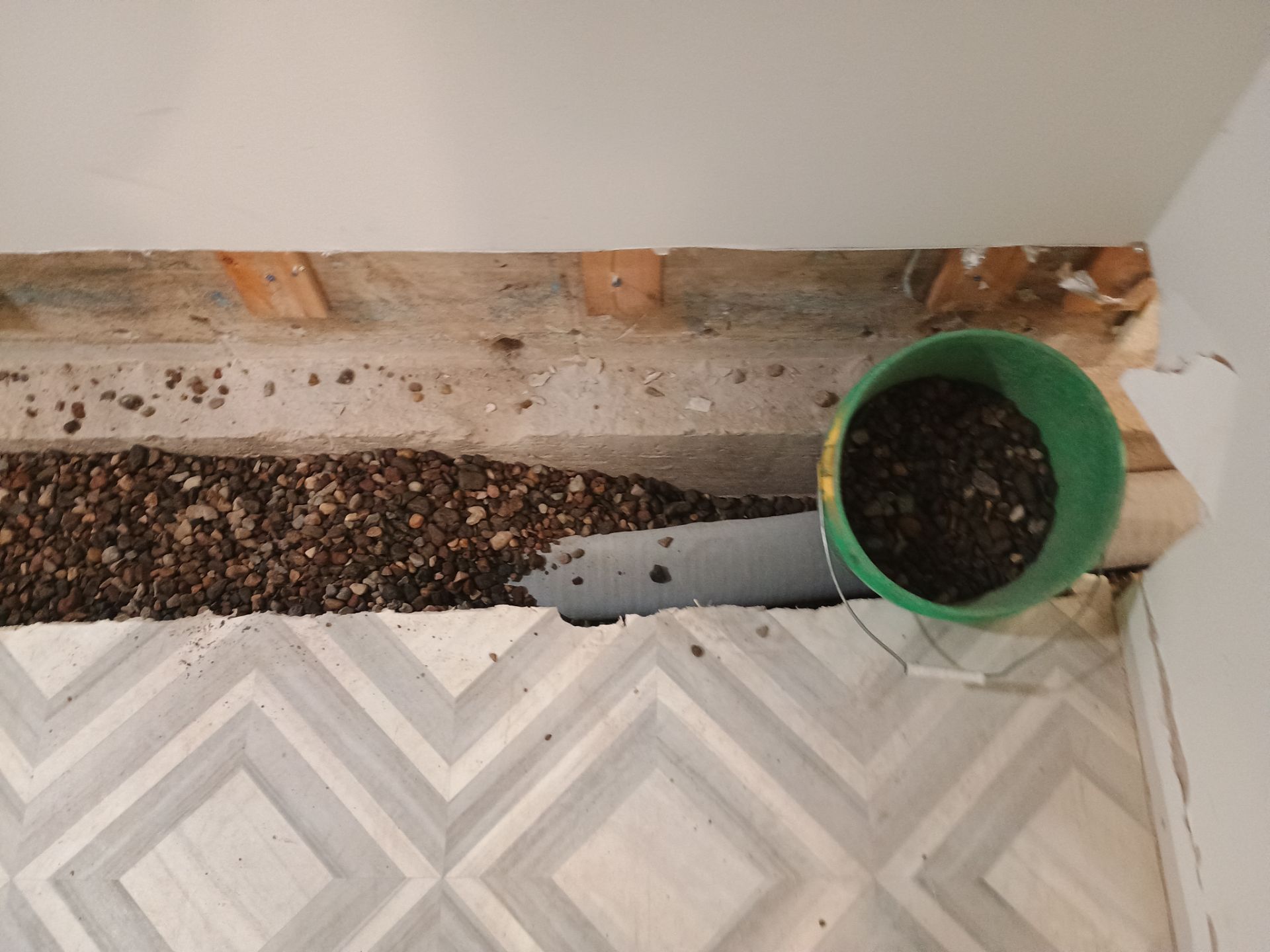 Interior Drain Tile & Buried Discharge in St. Anthony, MN by Waterproofing Northeast