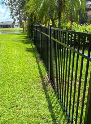 Aluminum Fence Installation using Black 3 Rail Aluminum Fence