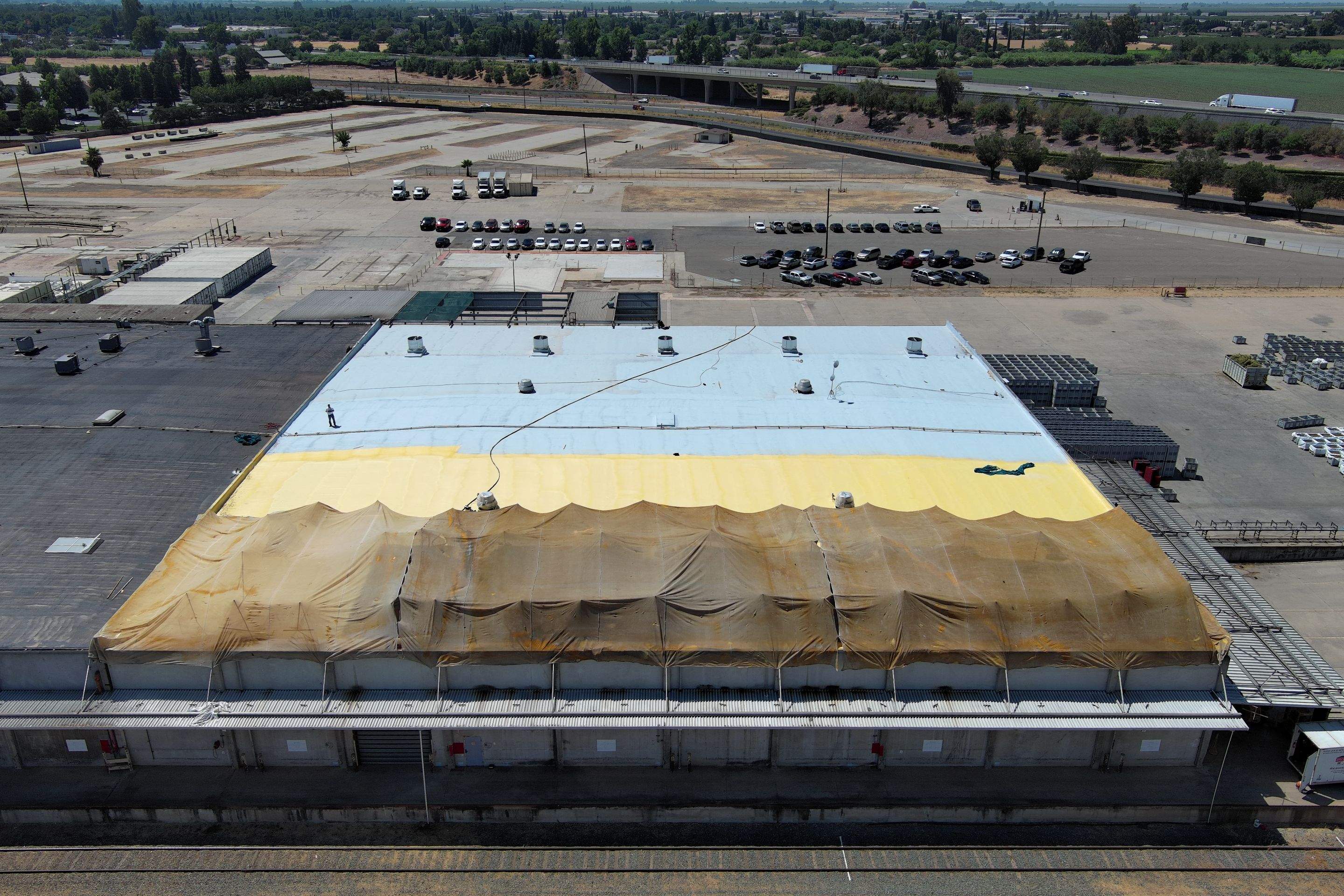 Pro Farms Spray foam roofing project by Straight Edge Roofing Inc