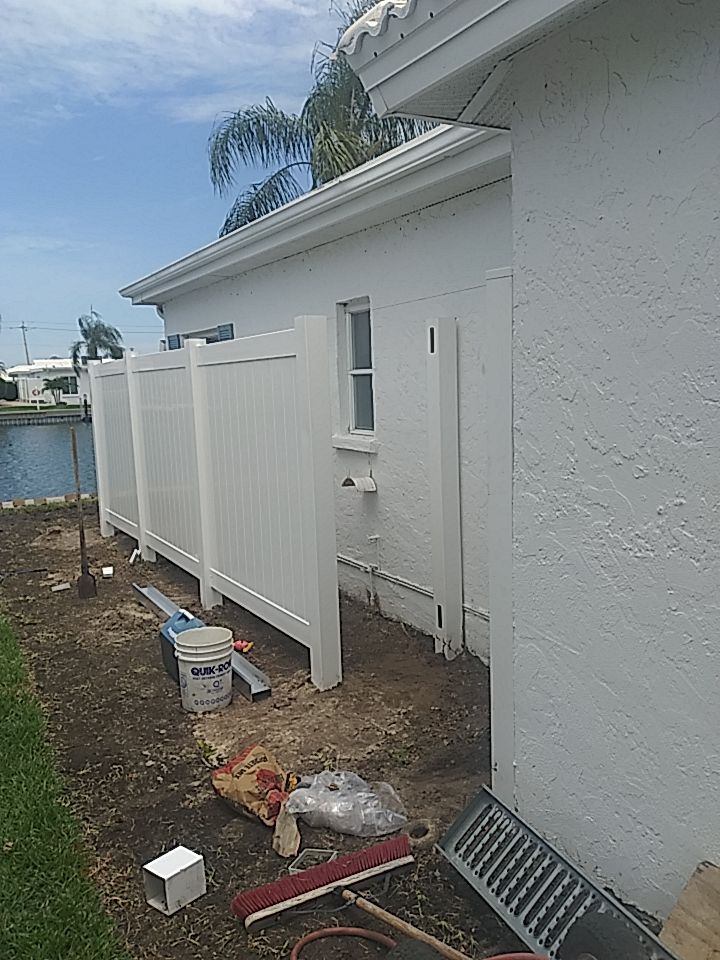 Vinyl privacy fence installation used as a shower enclosure.  by Asap fence and gates, LLC