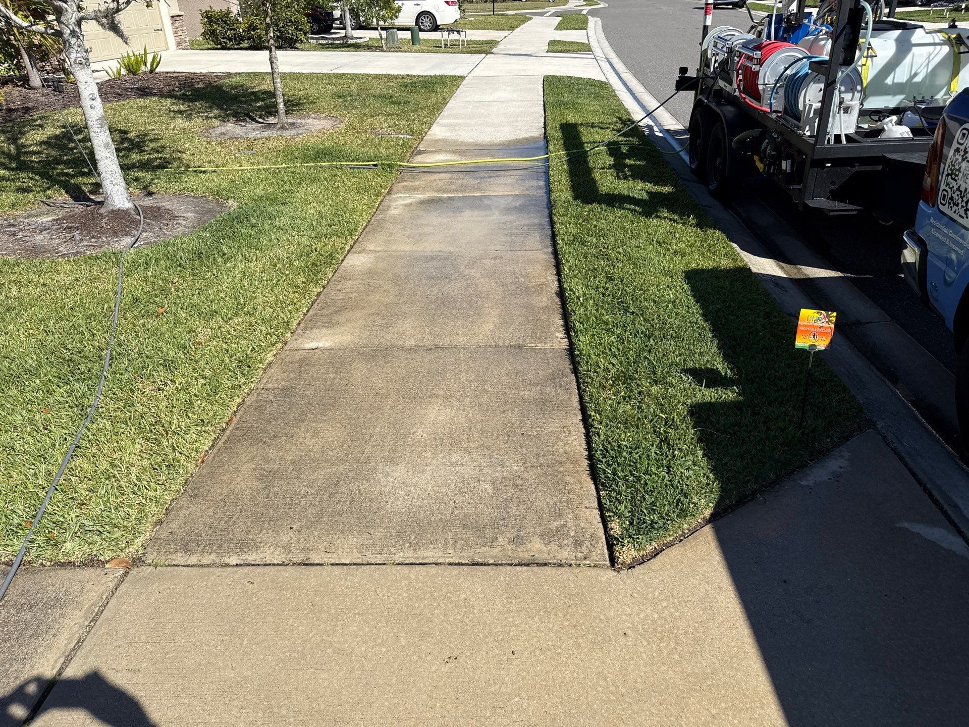 Painted Lanai Floor, Screen Enclosure, and Driveway Cleaning in Trevesta Community, Palmetto, FL by Sunshine AquaWash