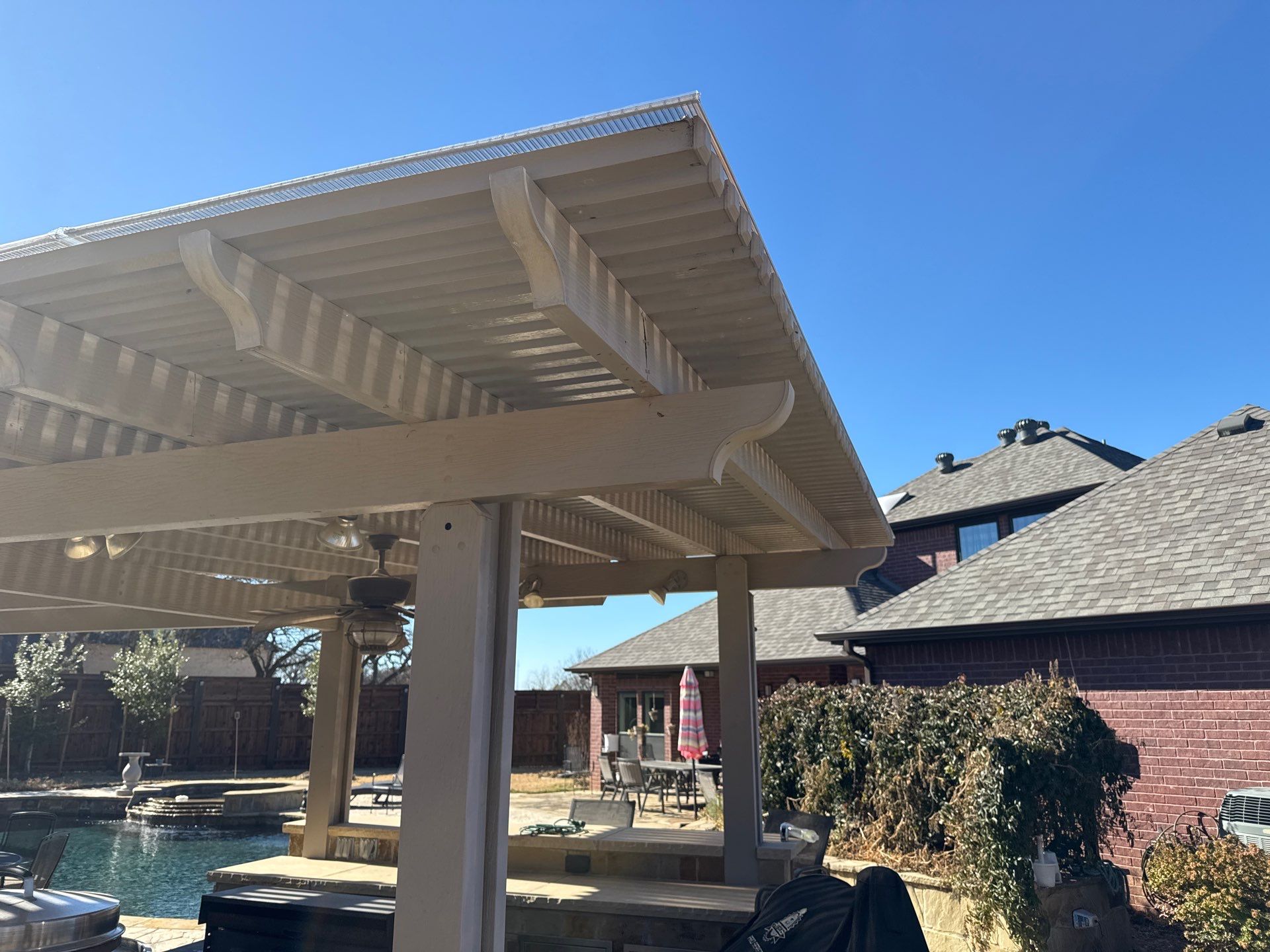 Polygal twin wall roofing system using 8mm bronze twin wall polygal by Grizzly Fence And Patio