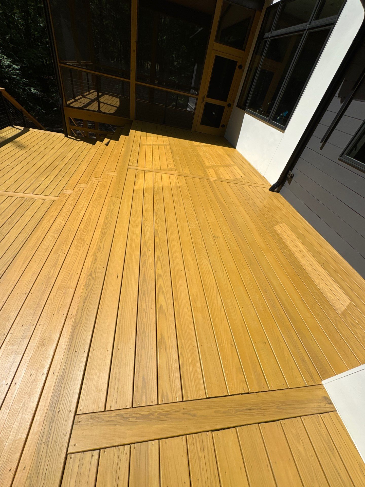Porch and Deck staining  by GonzalezPainters & Contractors Inc 