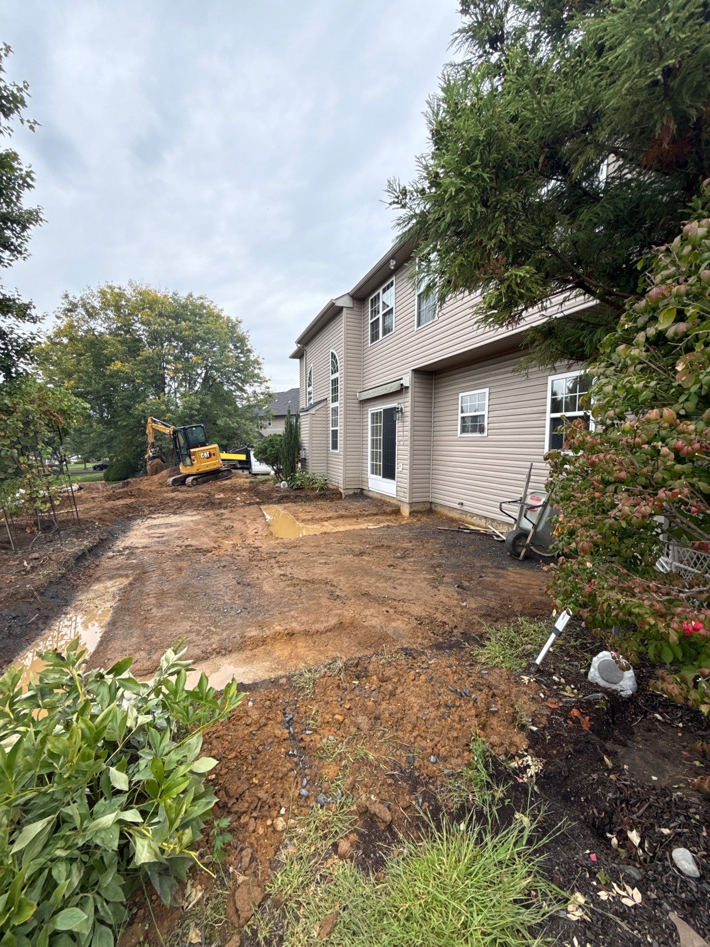 Backyard Retreat: Techo-Bloc Patio + Firepit Lounge by Saylor’s Lawn & Landscape