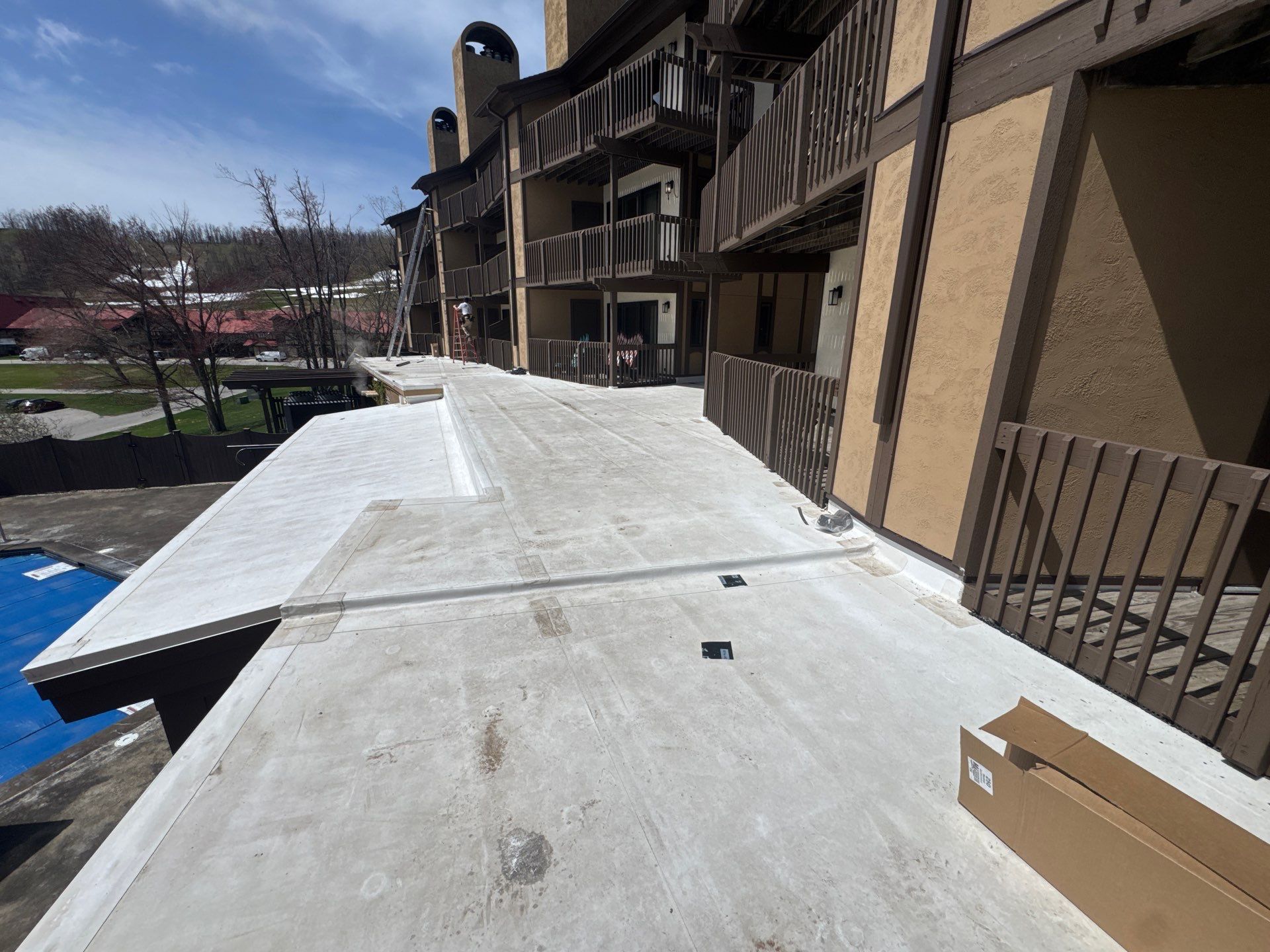 Gutter and Gutter Helmet Installation for Harbor Springs Hotel by Rainbow Seamless Systems
