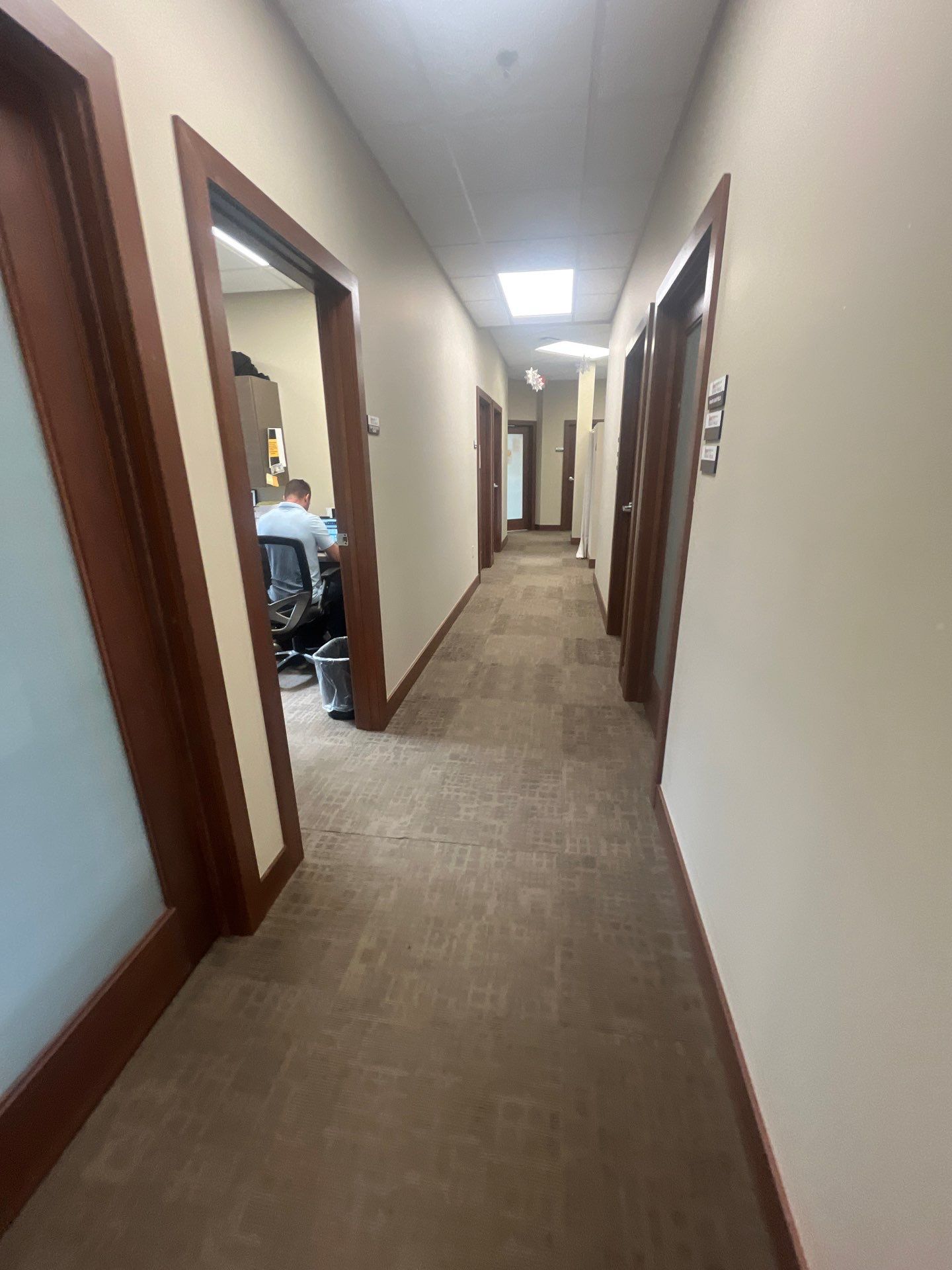 Commercial Office Interior Remodel and Modern Suite Refresh in Sioux Falls by Select Painting, Coatings & Garage Cabinets