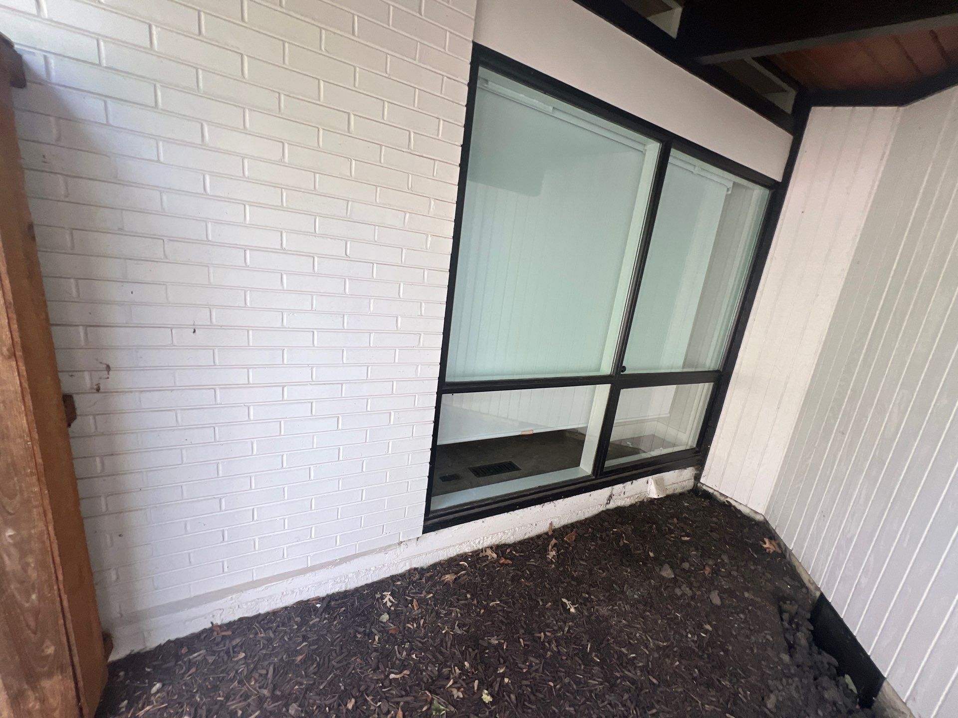 Complete Exterior House, Bluestone & Garage Floor Cleaning by Northern Power Washing LLC.