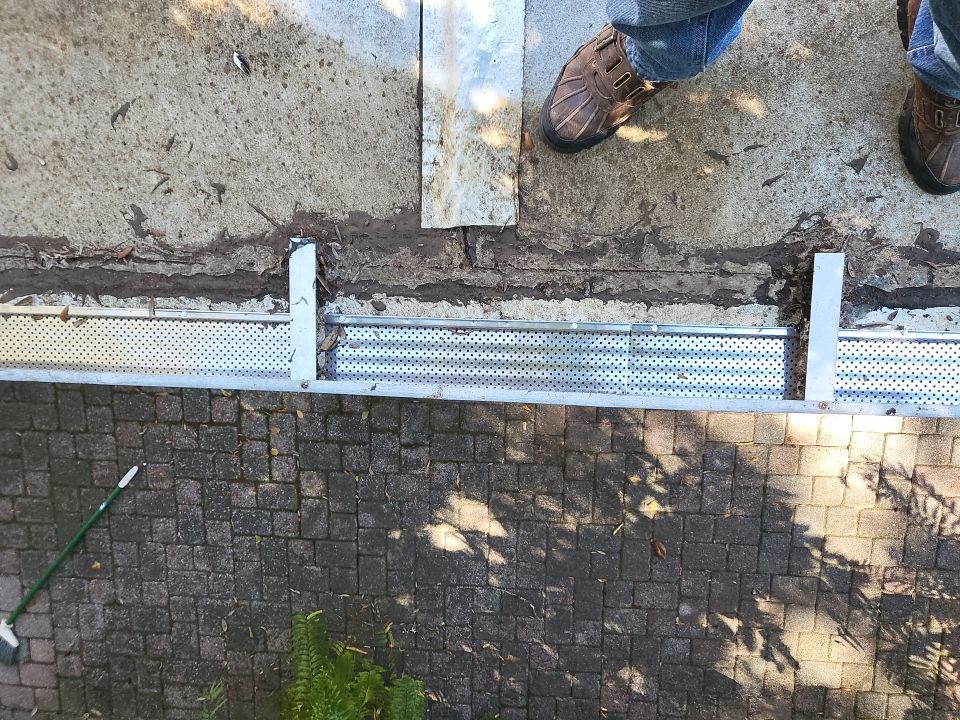 Seamless Gutter Installation using K-Style Seamless Gutters and LeafBlaster Pro Gutter Guards by Gutter Professors