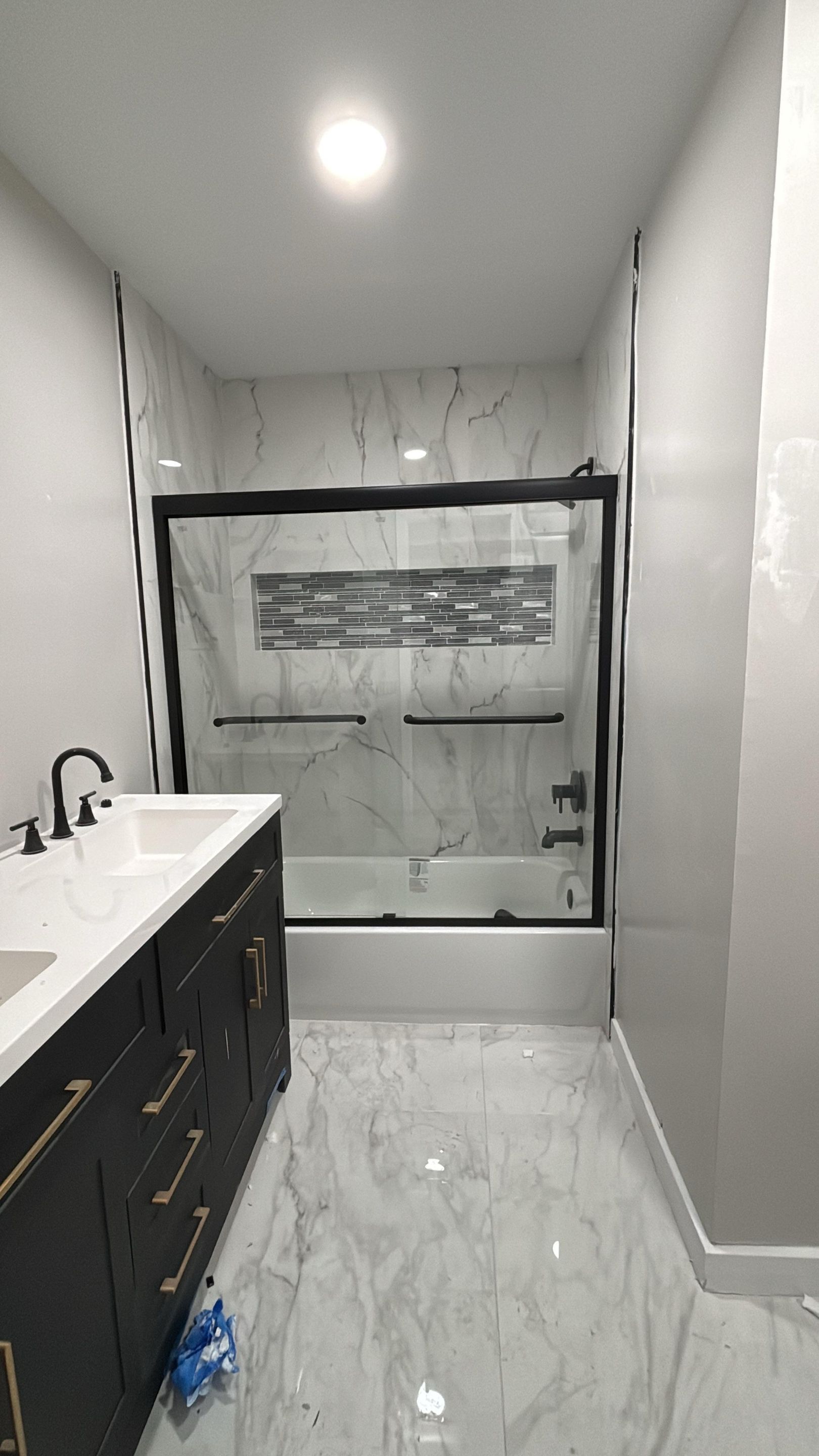 Master Bathroom, Children's Bathroom, and Fireplace Renovation by urban green energy llc