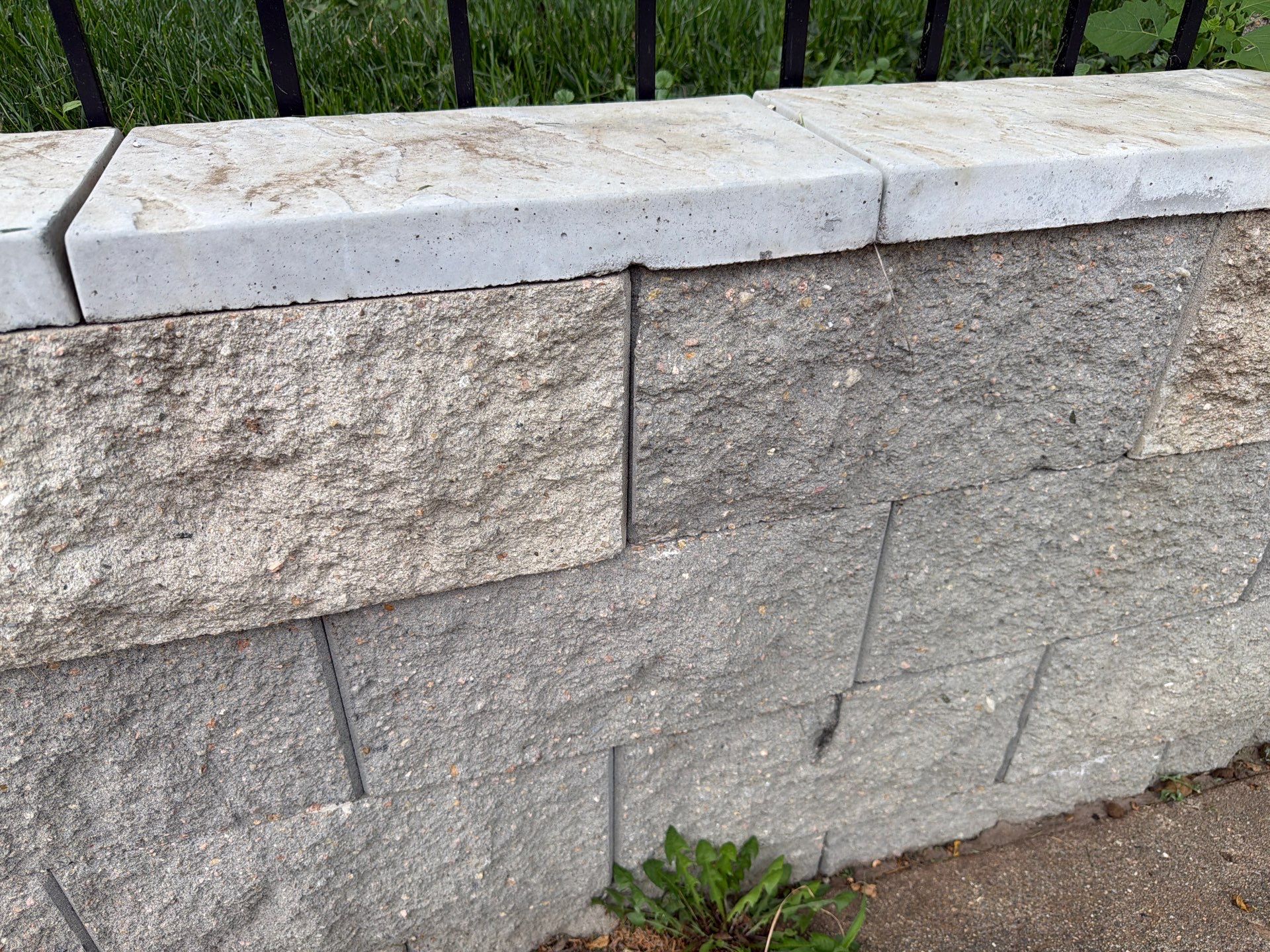Exterior Masonry Painting for a Sioux Falls Retaining Wall by Select Painting, Coatings & Garage Cabinets
