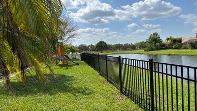 Aluminum Fence Installation using Black 3 Rail Aluminum Fence