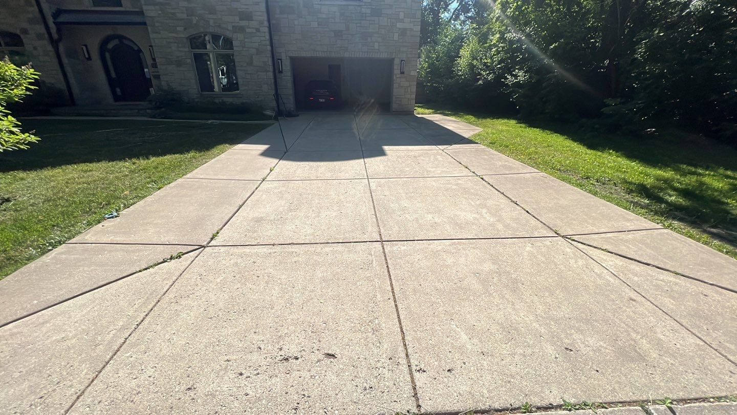 Highland Park, IL Bluestone, concrete,  Trex deck cleaning by Northern Power Washing LLC.