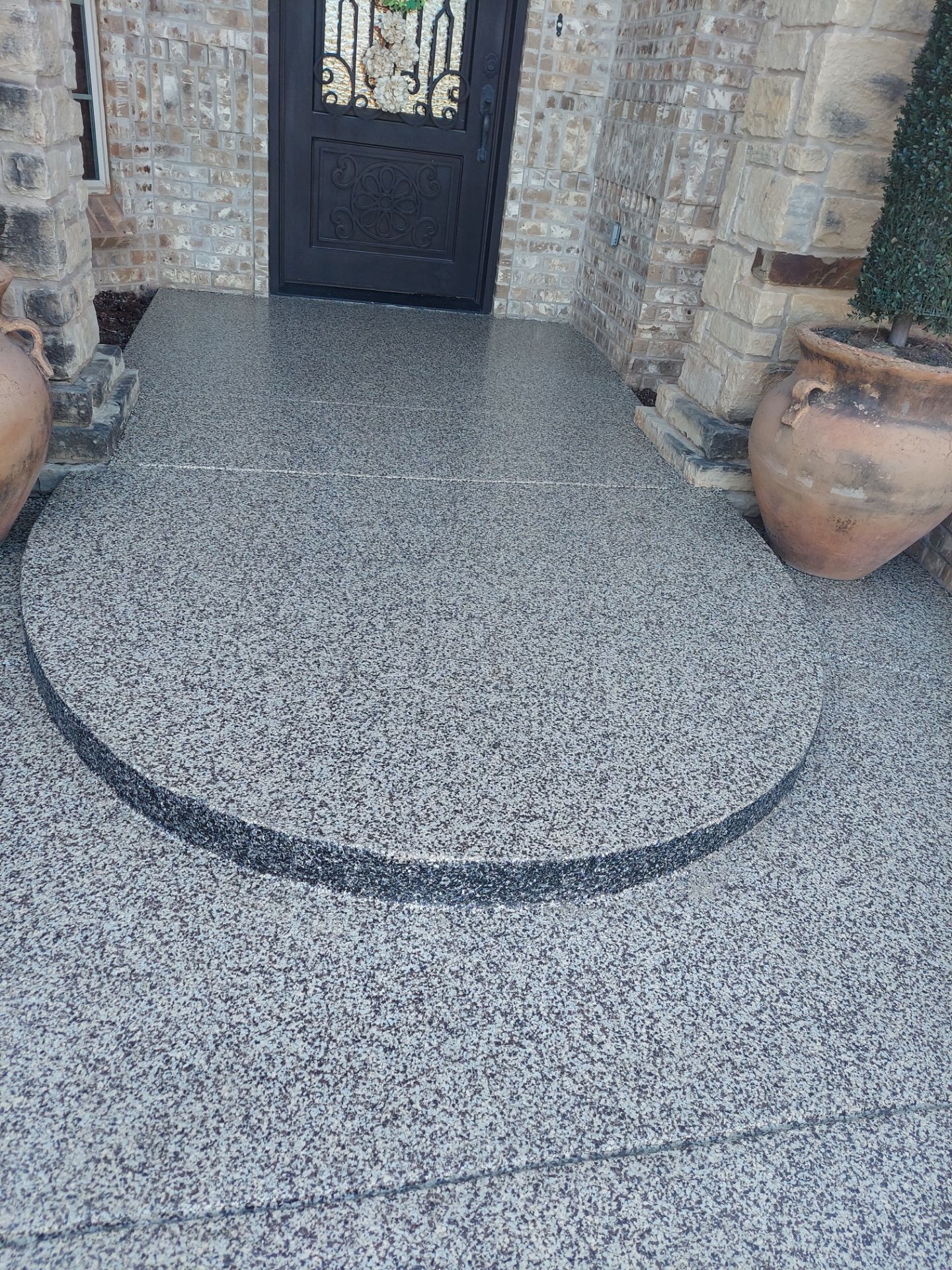 Patio Coating Installation using Cordwood by Copperhead Coatings