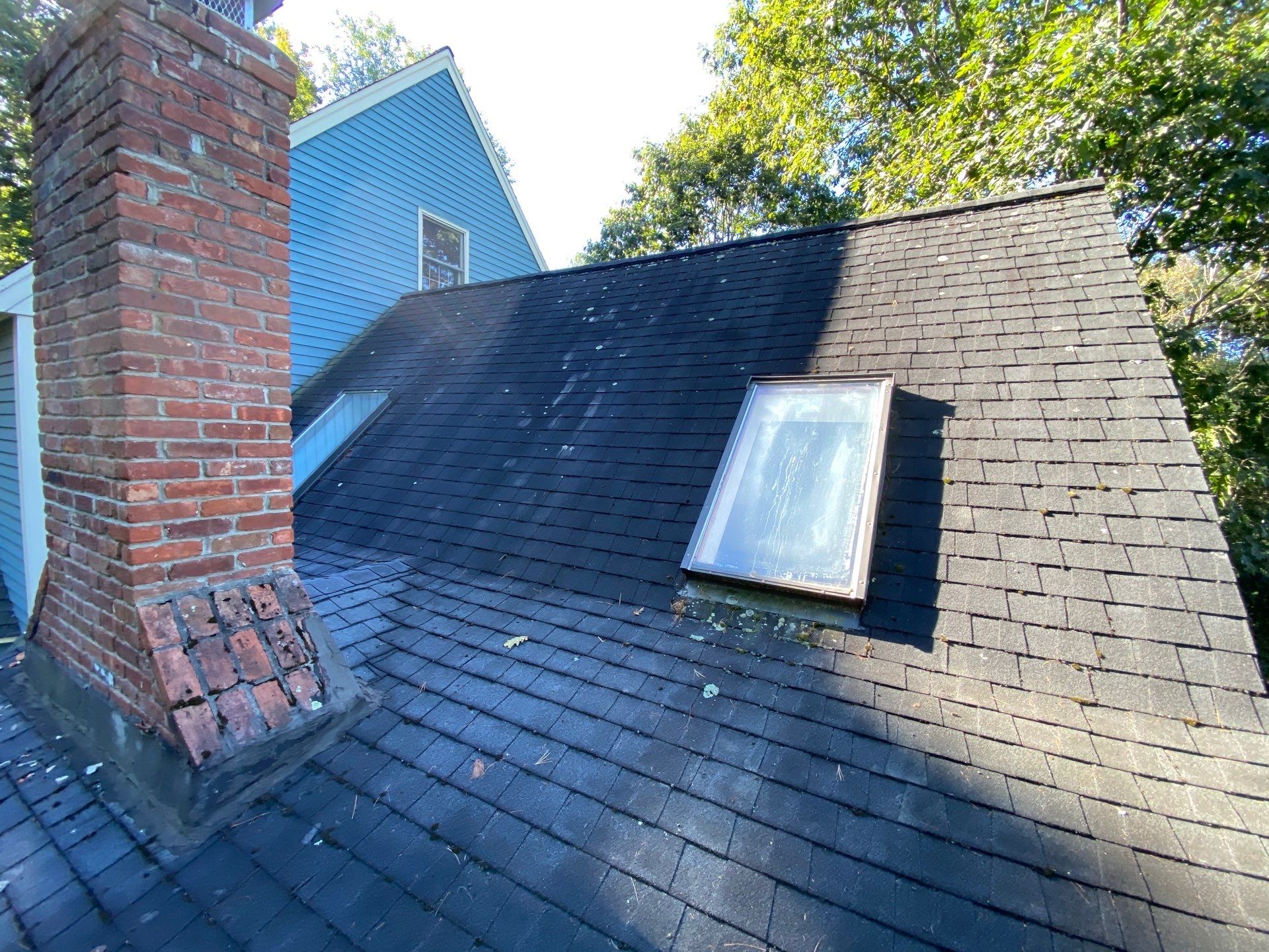 Milford Complete Roof Replacement with Velux Skylight Upgrade by Mighty Dog Roofing of Greater Middlesex County