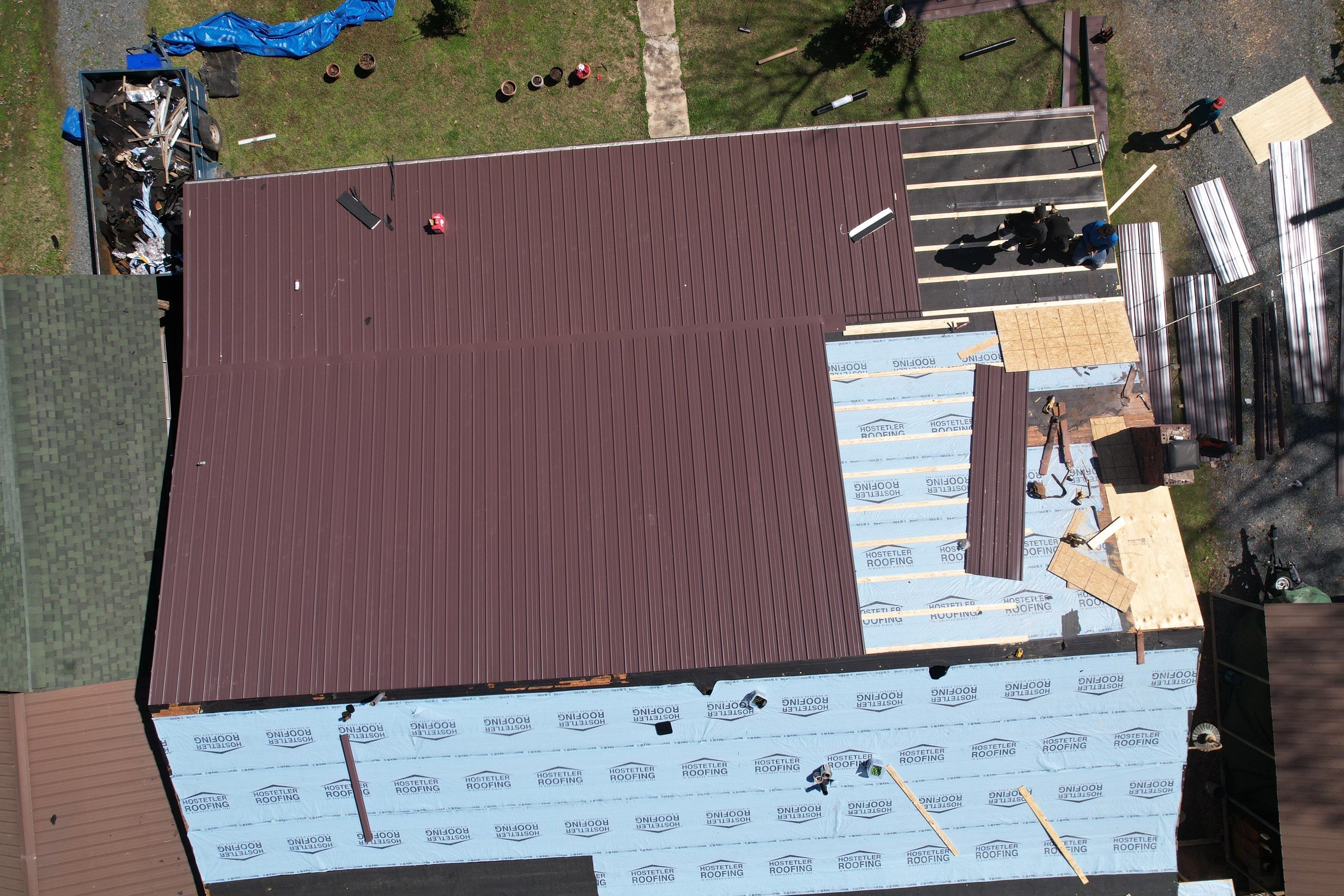 Residential Roofing Installation using 29 Gauge Colored Metal by Hostetler Roofing