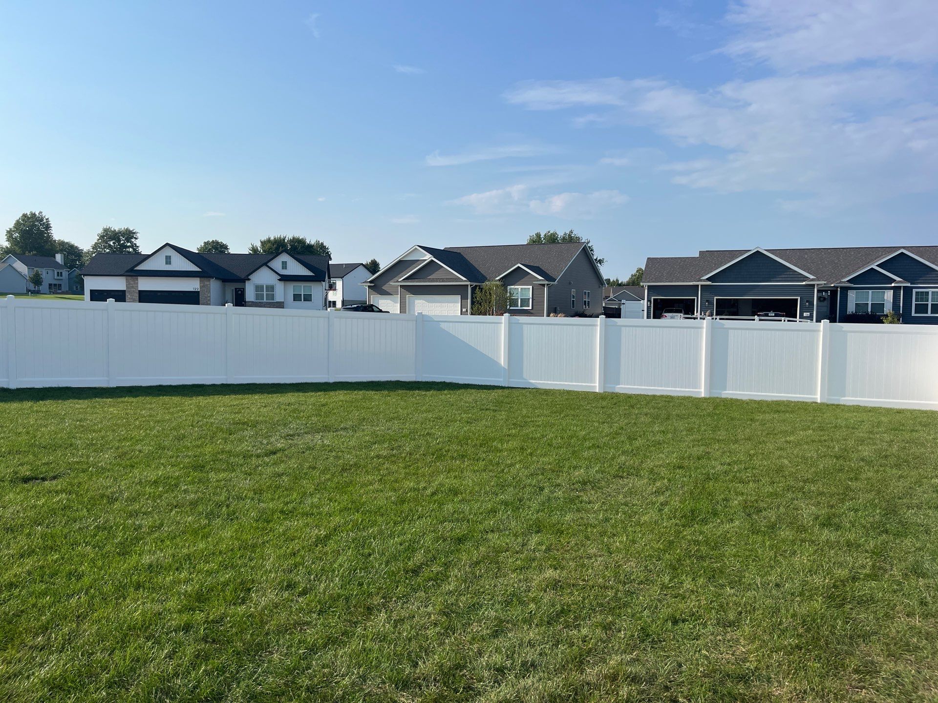 White Vinyl Privacy Fence Installation With Double Gates in Waterloo by Perfect Picket Fence and Stain