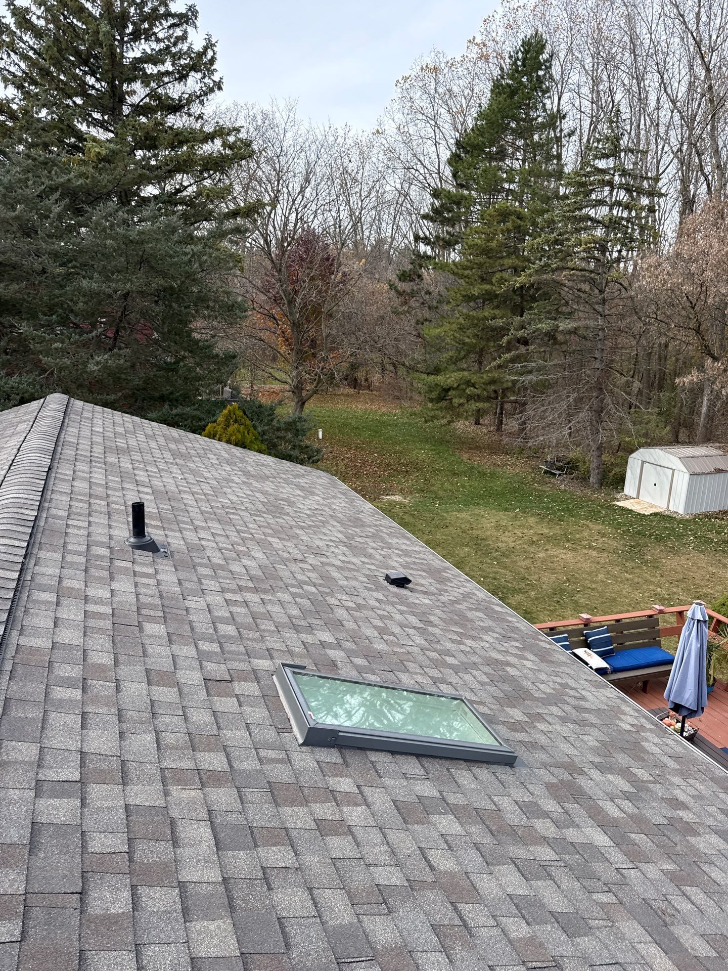 Weathered Wood Roof and Egress Window by 42 North Construction, LLC.
