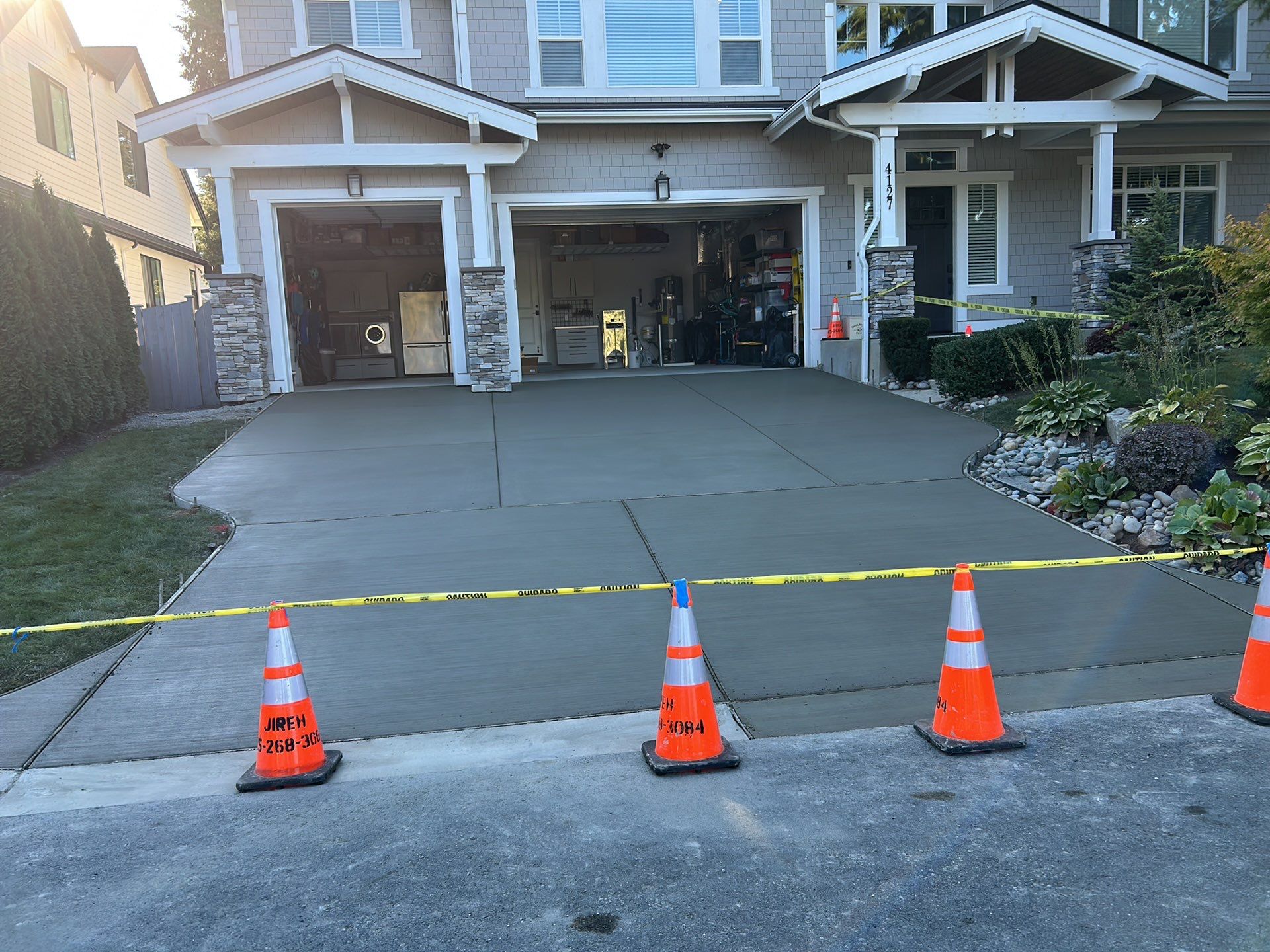 MN Custom Homes | Concrete Driveway  by Jireh Asphalt & Concrete Inc 