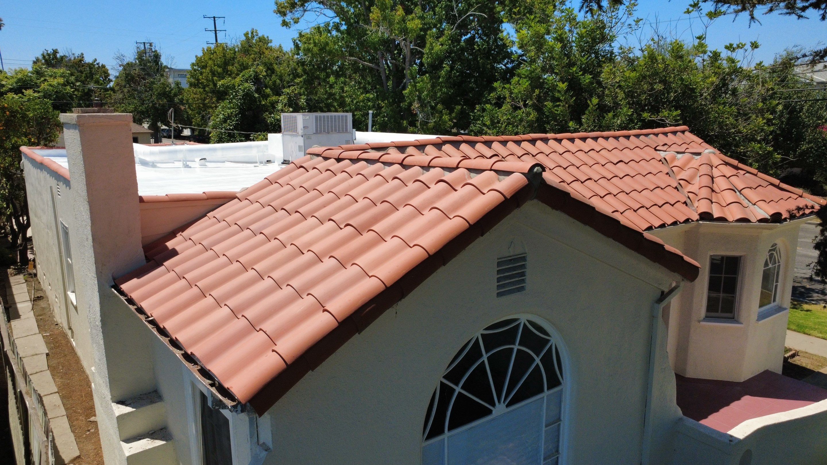 Tile Reset and Silicone Membrane Installation by Hull Brothers Roofing