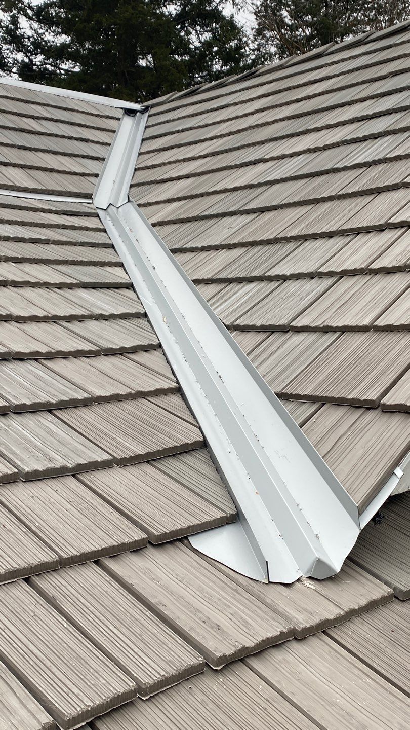 DaVinci Roof Installation with Snow Guards in Oconomowoc Lake by Custom Installations
