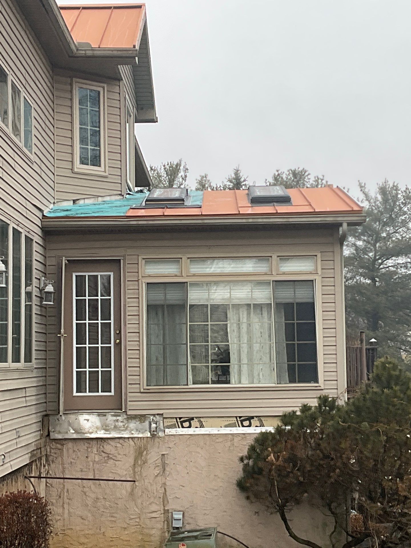 Standing Seam Roof – Copper Finish by Esh Builders