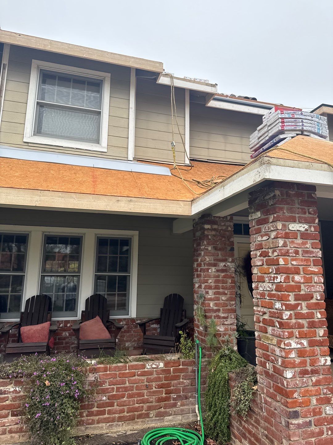 New shingles and gutters using GAF Timberline HDZ shingles and aluminum gutter by Straight Edge Roofing Inc
