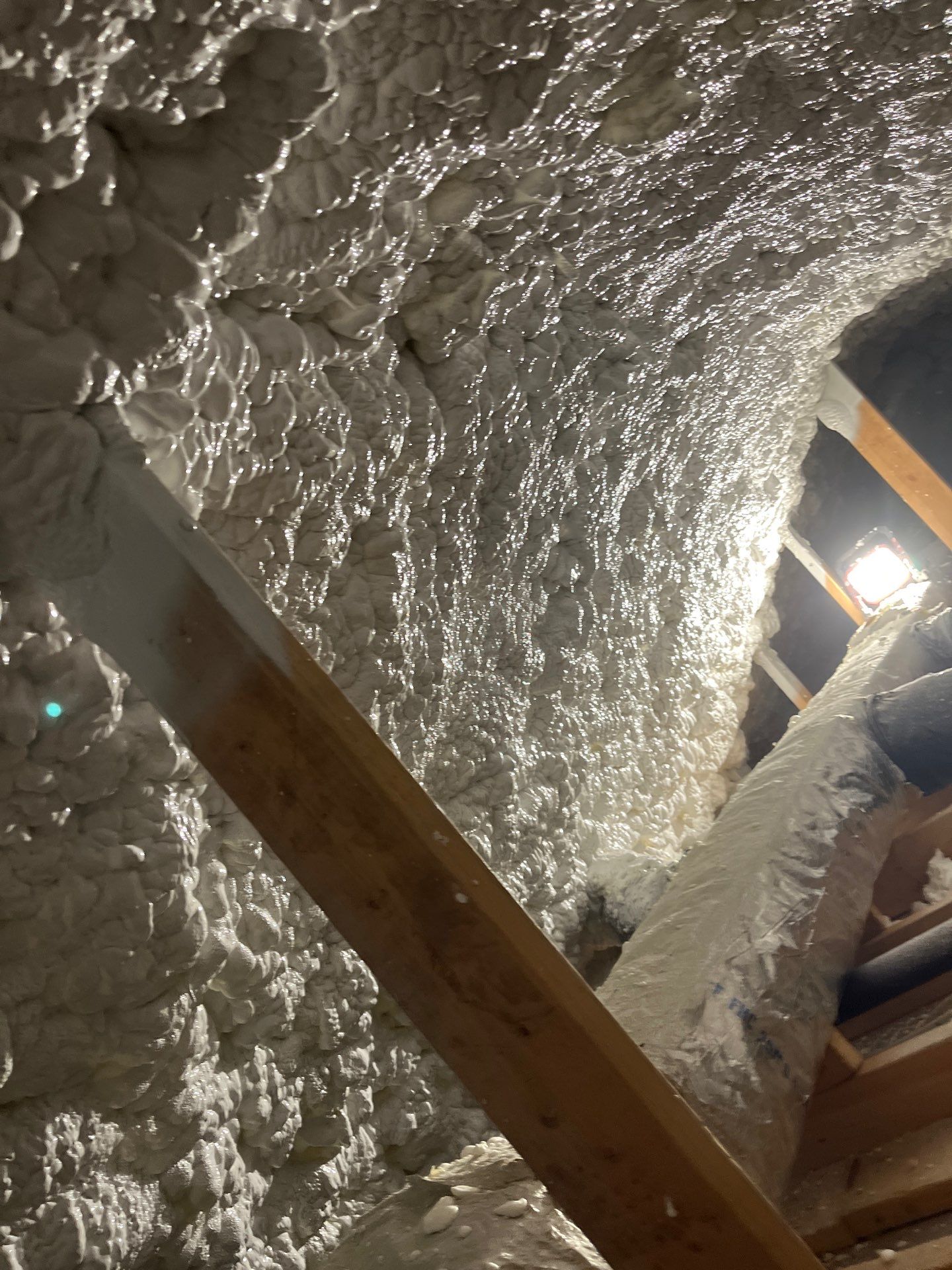 Attic Insulation using open cell spray foam by NYS Foam & Energy