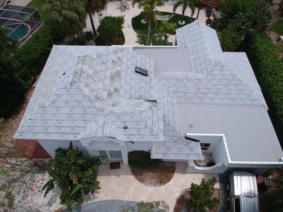 Residential Roofing Installation using 1" Nail strip metal roof by BLUES BROTHERS ROOFING