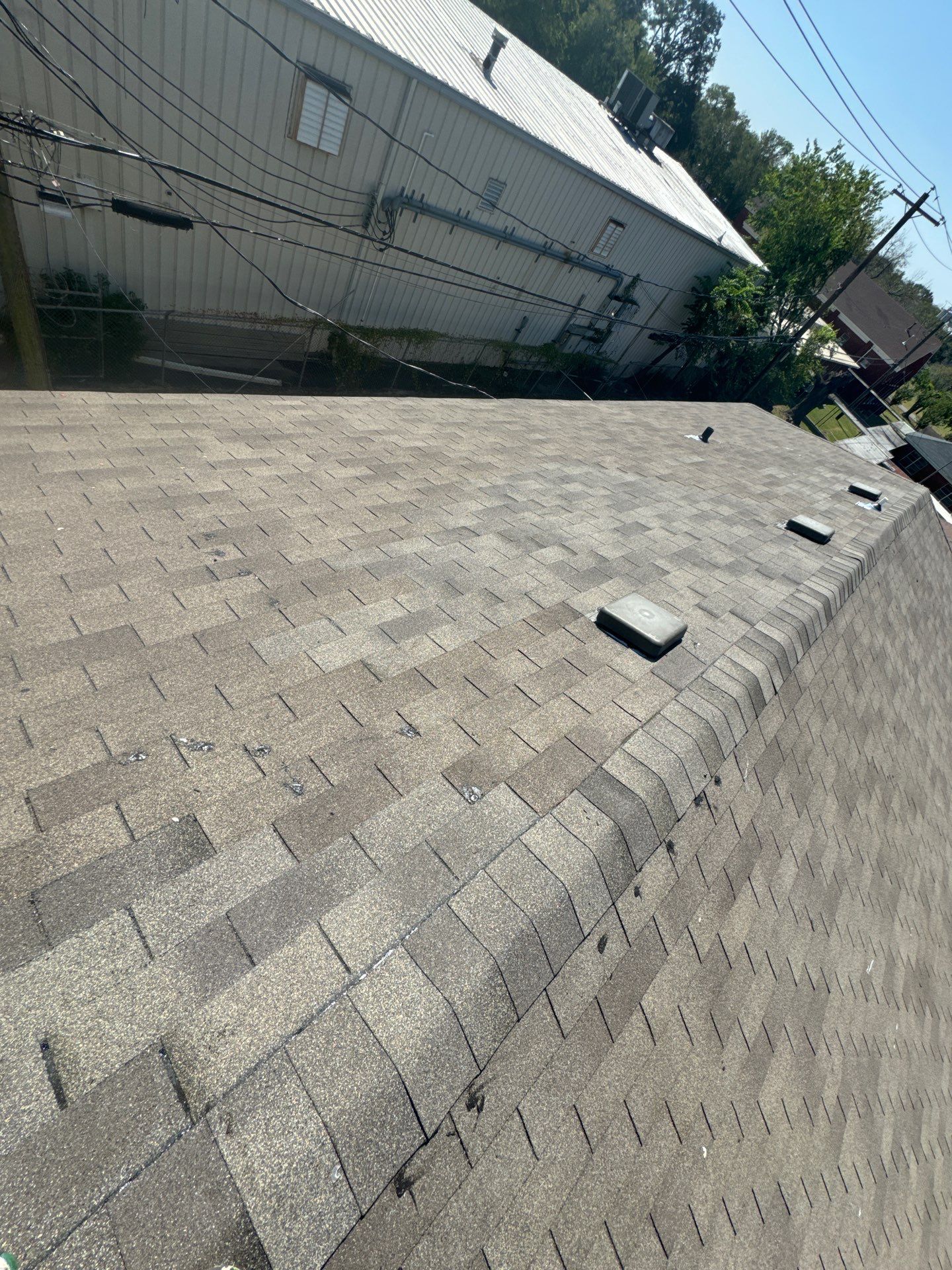 Apartment Roof Replacement by Associates Roofing Unlimited 