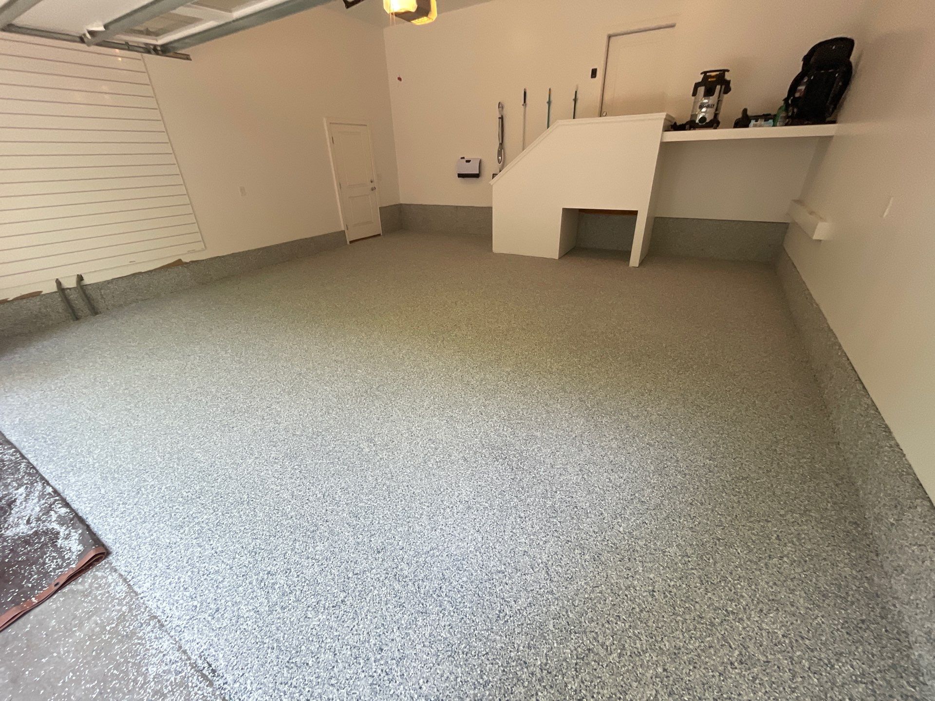 Garage Transformation in West Michigan | Full Interior Repaint & Epoxy Flake Floor in Tidal Wave Blend by Gordon Painting