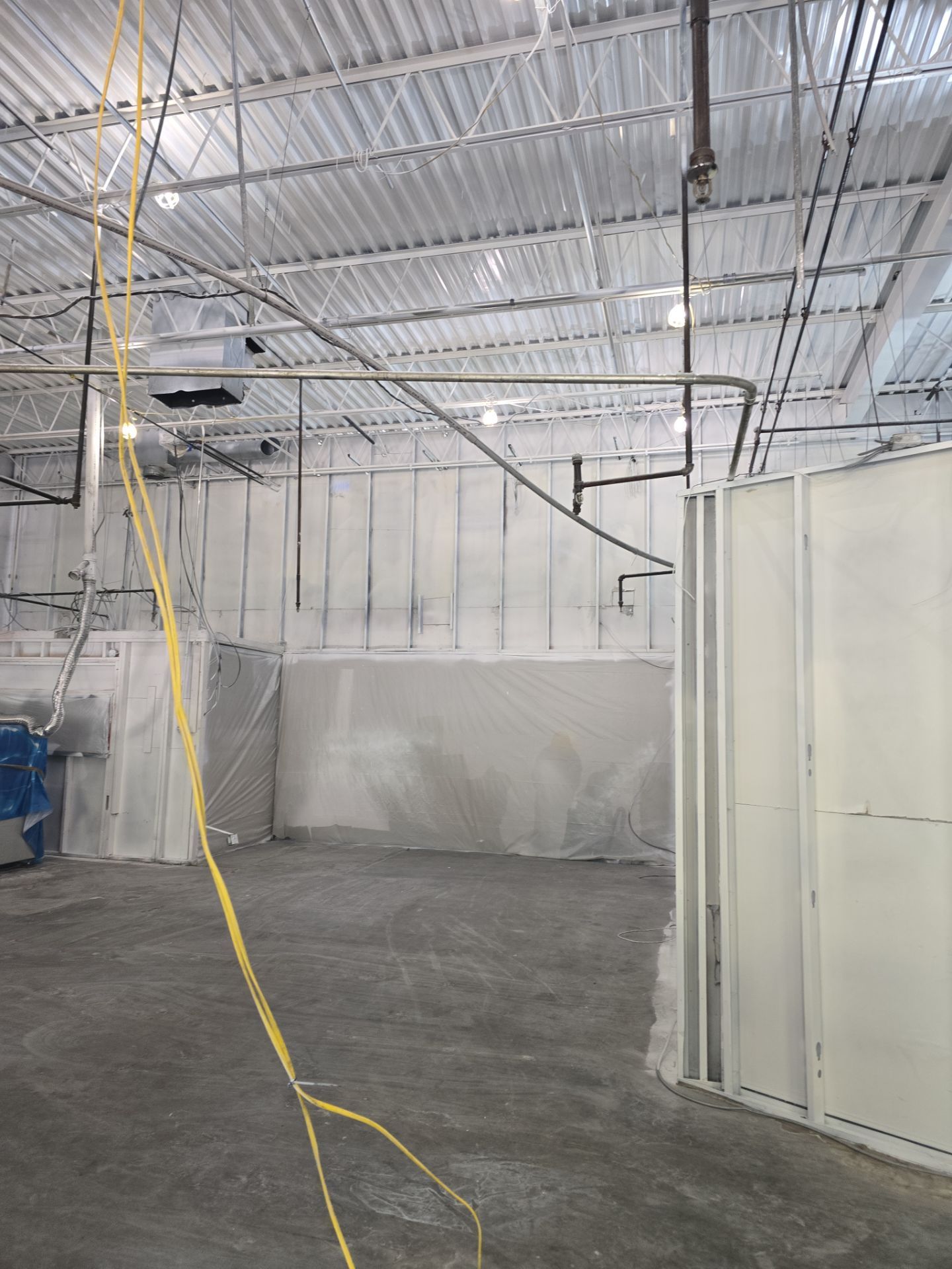 Industrial Warehouse Fire Damage Cleaning and Spray Sealing in Islandia by EMS Restoration Corp