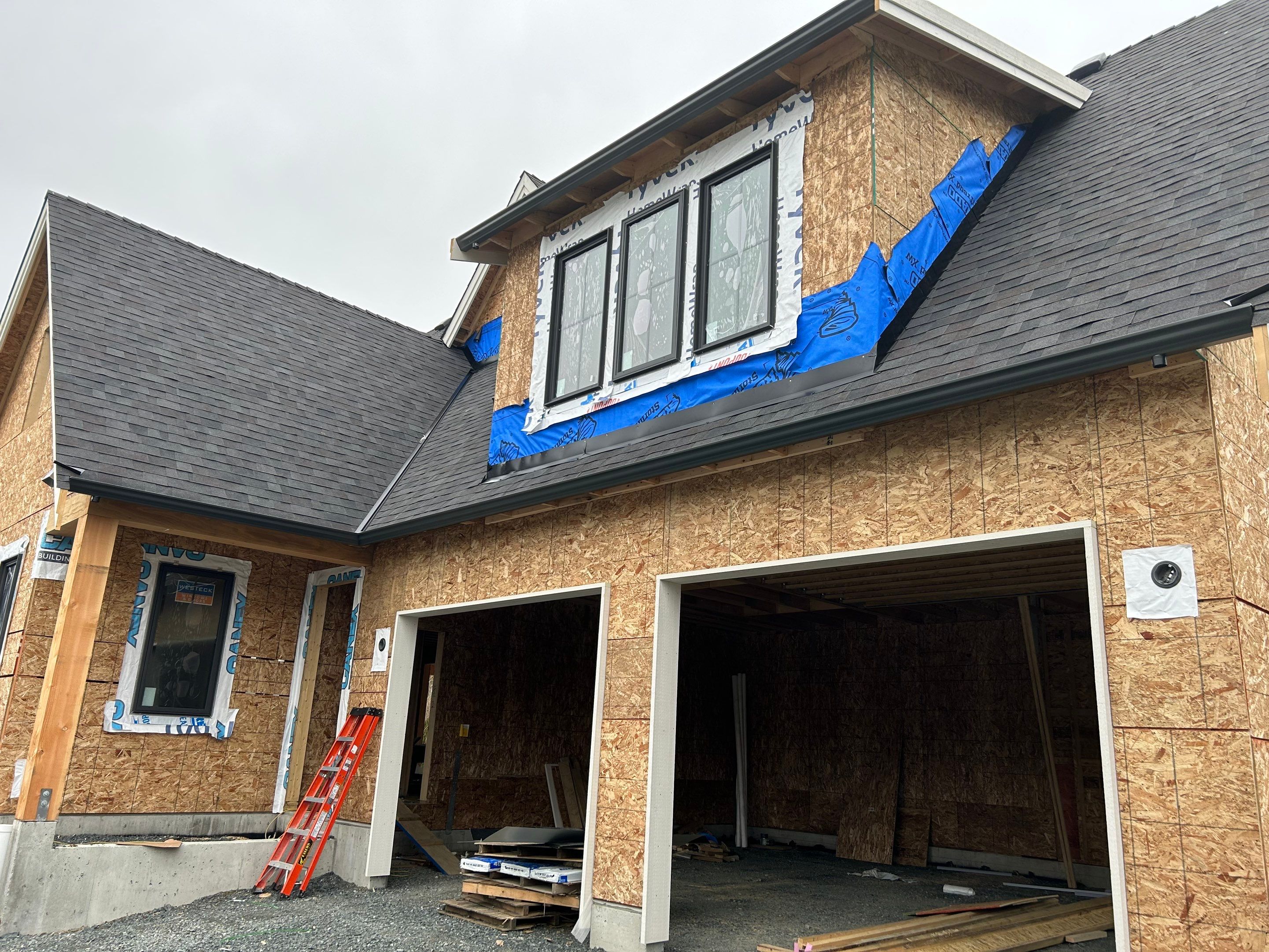 Residential Roofing Installation using Malarky Vista Shingles and Prolok Metal  by Top Notch Roofing Inc