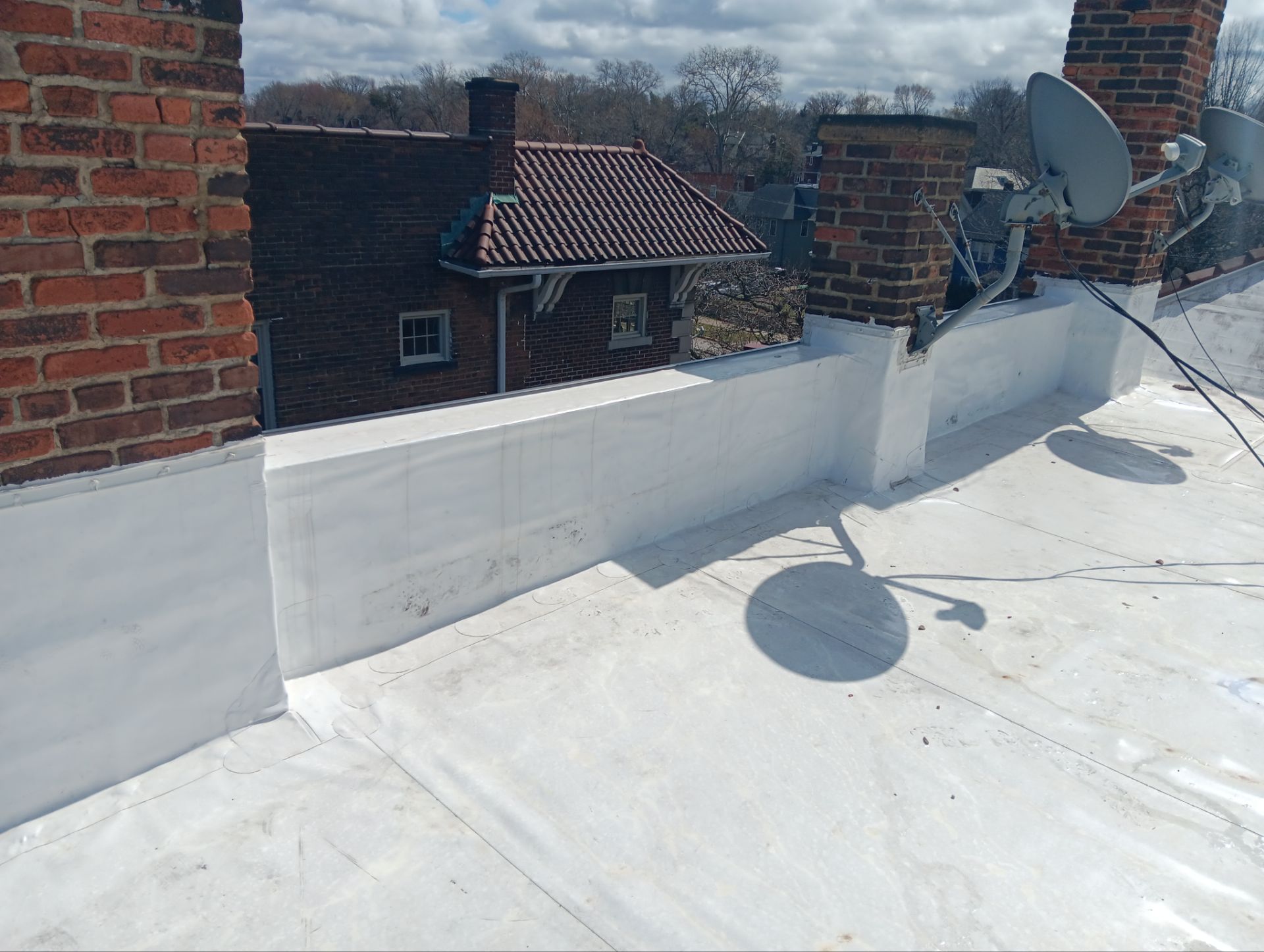 Commercial Roofing Installation using Duro-Last 50 mil PVC by 3 Daughters Construction 