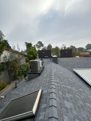 Residential Roofing Installation using Shingles and Silicone