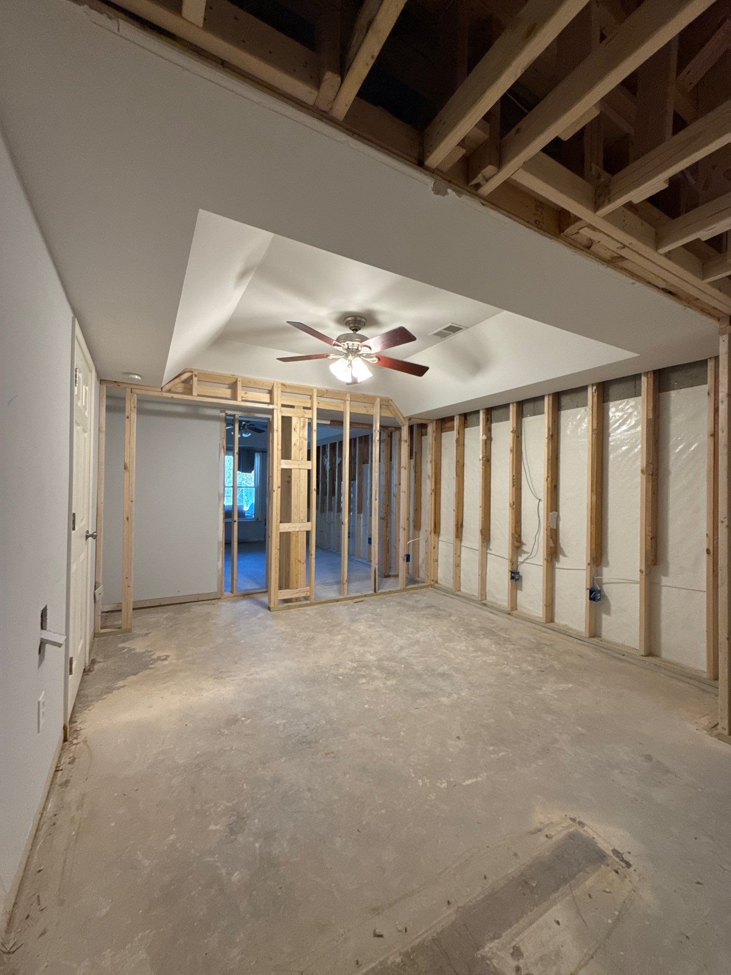 Full Basement Remodeling with Custom Flooring and Tray Ceilings in Marietta by Swift Home Renovations