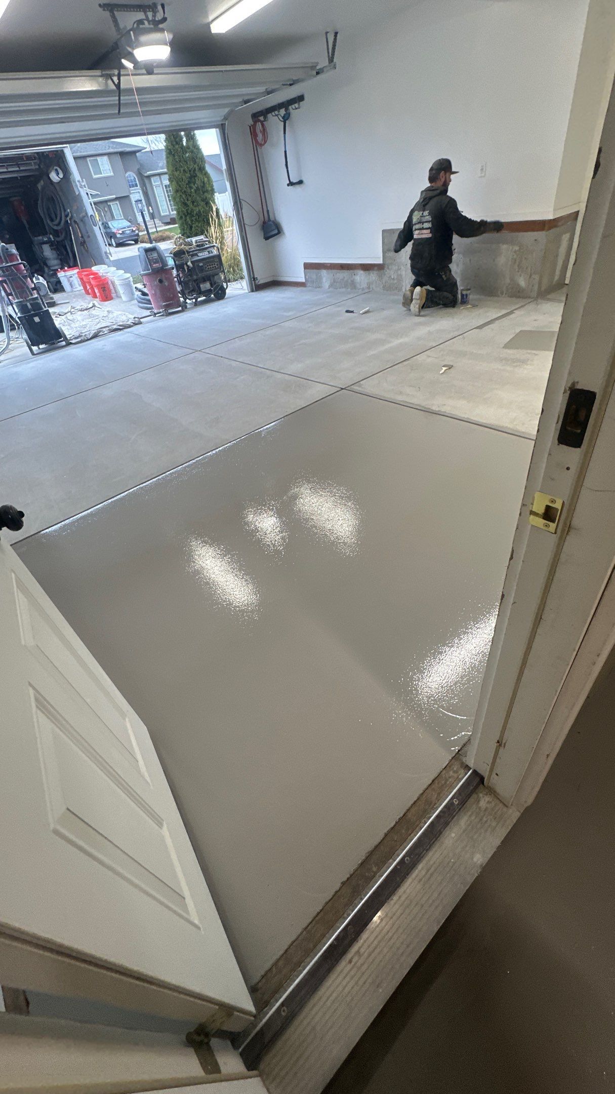 Garage Transformation using 1/8 Tidal Wave by Croc Coatings, LLC