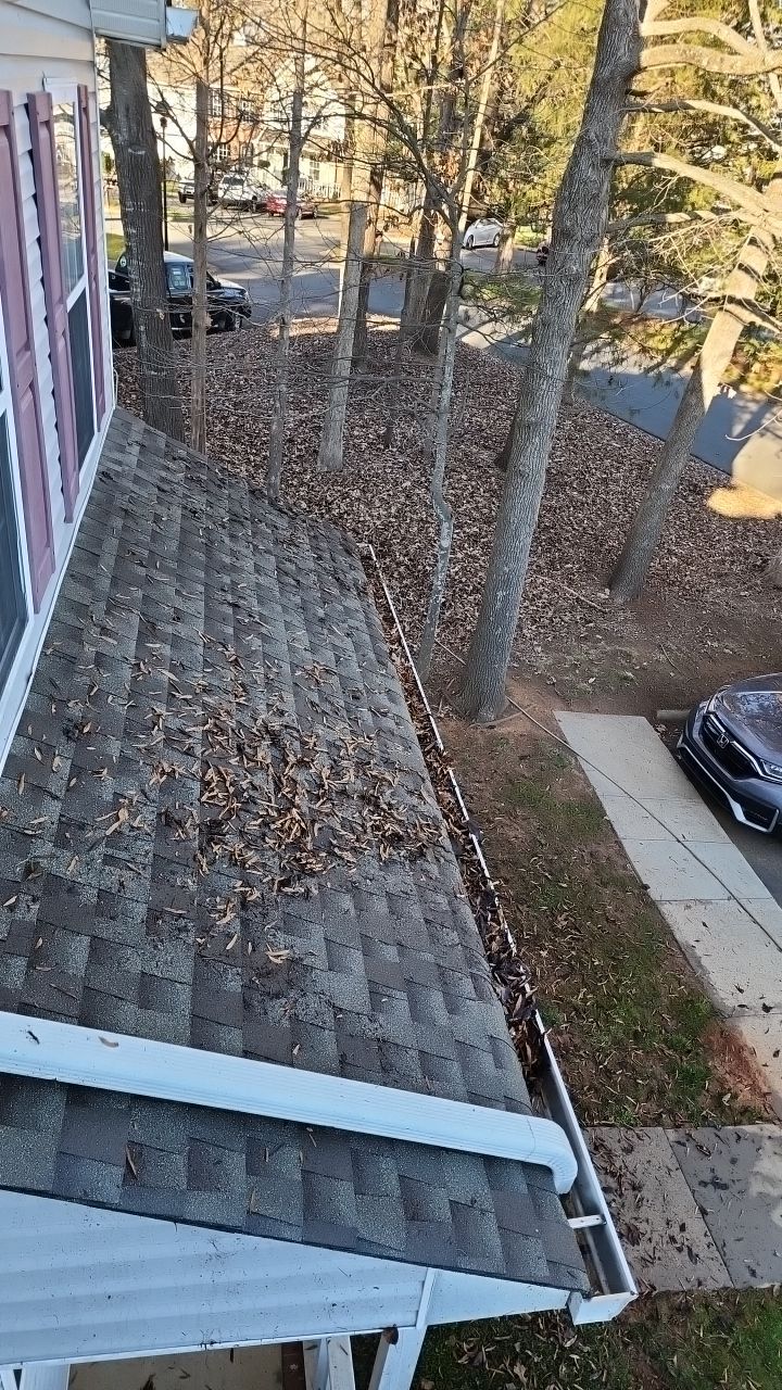 Gutter Cleaning using water by Power Wash Masters LLC