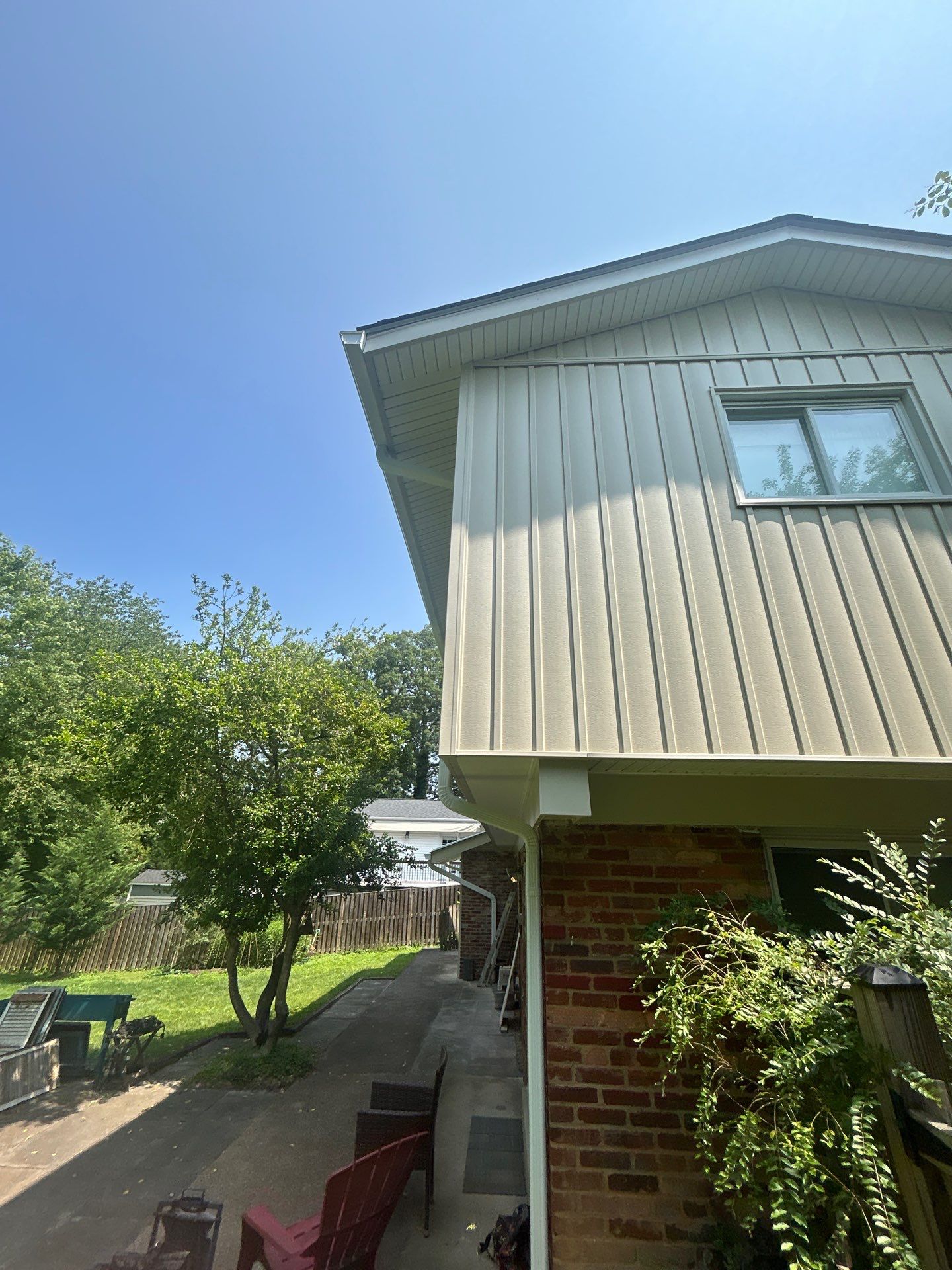 Fairfax: Residential Siding Replacement with CertainTeed 8" Board and Batten Siding in Desert Tan by RM Banning, Inc.