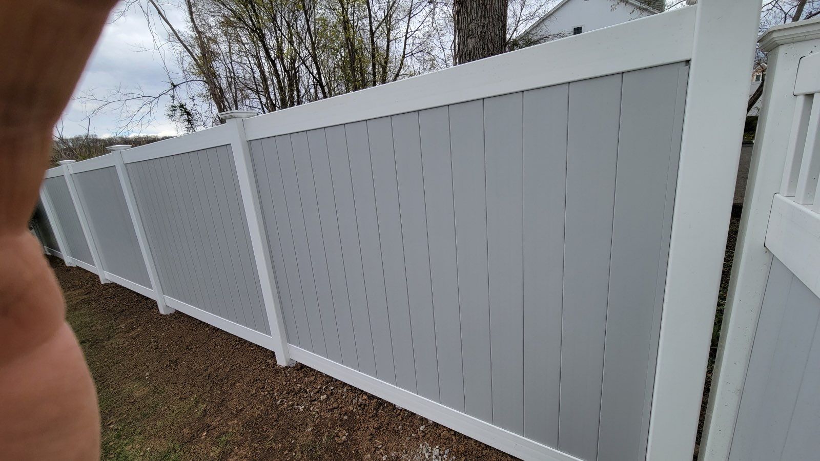 Vinyl privacy fence 6' tall, 2 tone White and Gray. by DiGiorgi Roofing and Siding Inc