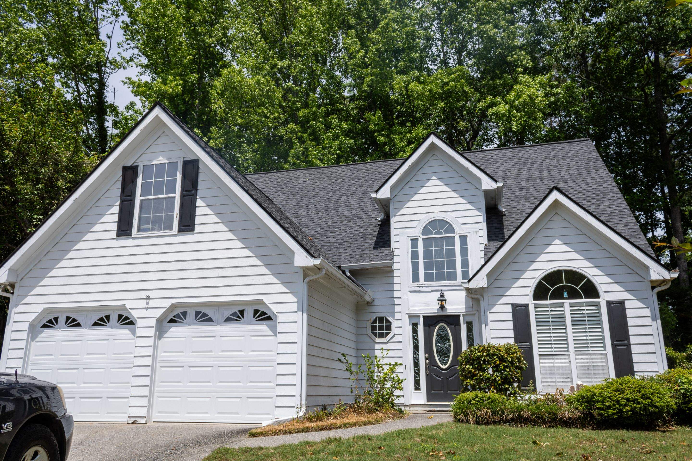 Alpharetta, GA Siding & Exterior Painting with Black Trim Before & After by Nelson Exteriors
