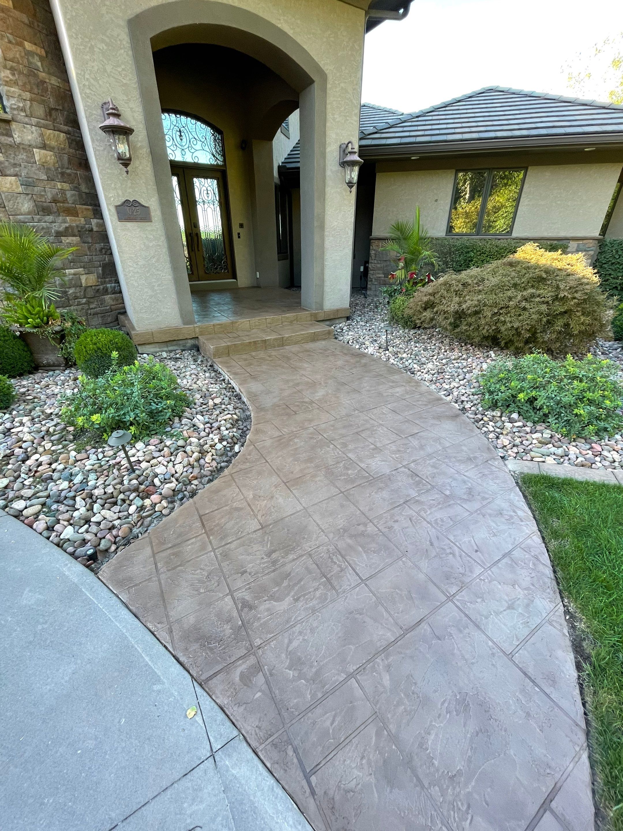 Lake Lotawana -- Front Walkway and Back Patio Tuscan Overlay by Big Red Decorative Concrete, LLC