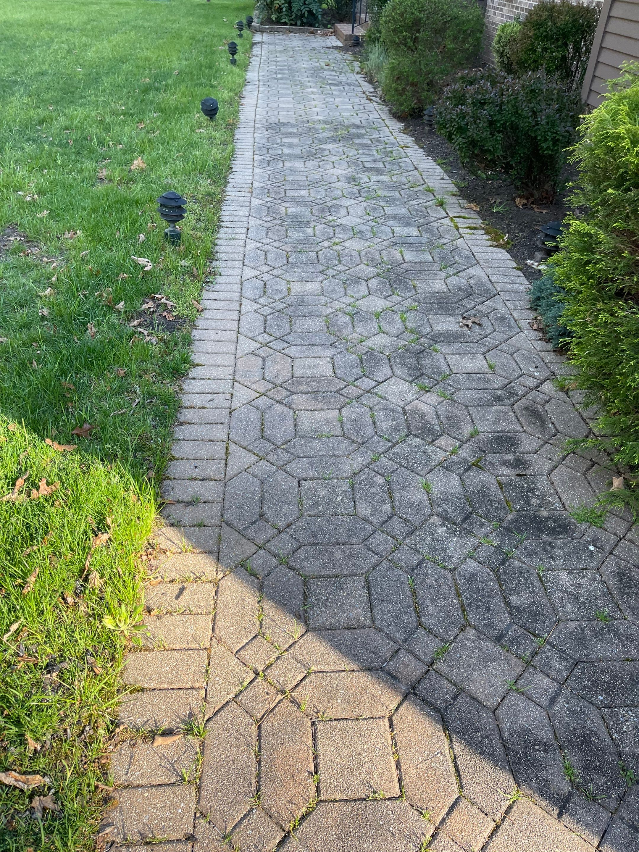 Pavers Cleaned, Garage and Concrete walls by SJ Exterior